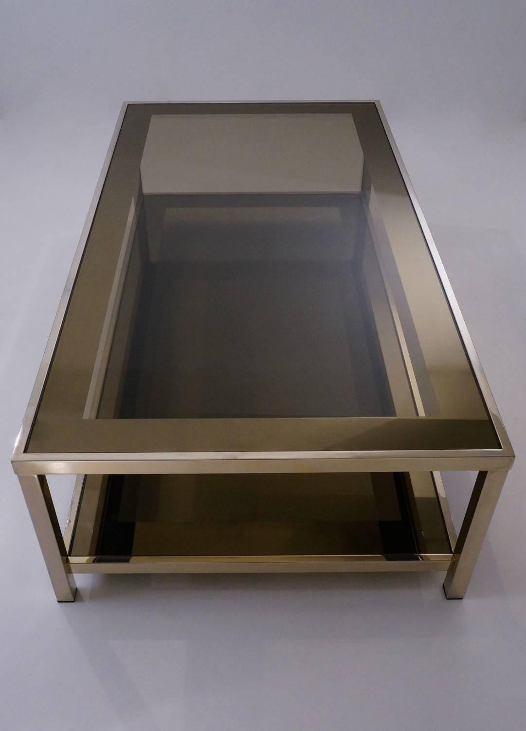 Gold-plated coffee table with shelf, 23-karat by Belgo Chrome, circa 1980s, Belgian.

This coffee table has been gently cleaned respecting the vintage patina. It is ready to use.

Belgo chrome was known for its handsome clean designs in hot