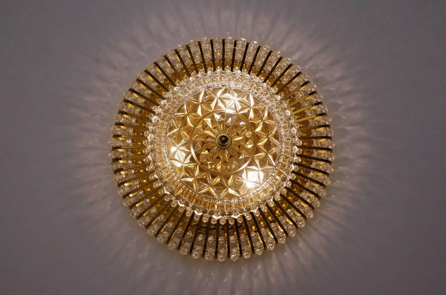 Hillebrand brass, glass and Lucite bead large pair of wall or ceiling lights, circa 1960s, German.

Thoroughly cleaned respecting the vintage patina. Newly rewired, earthed, in full working order and ready to install. Light bulbs included.

This