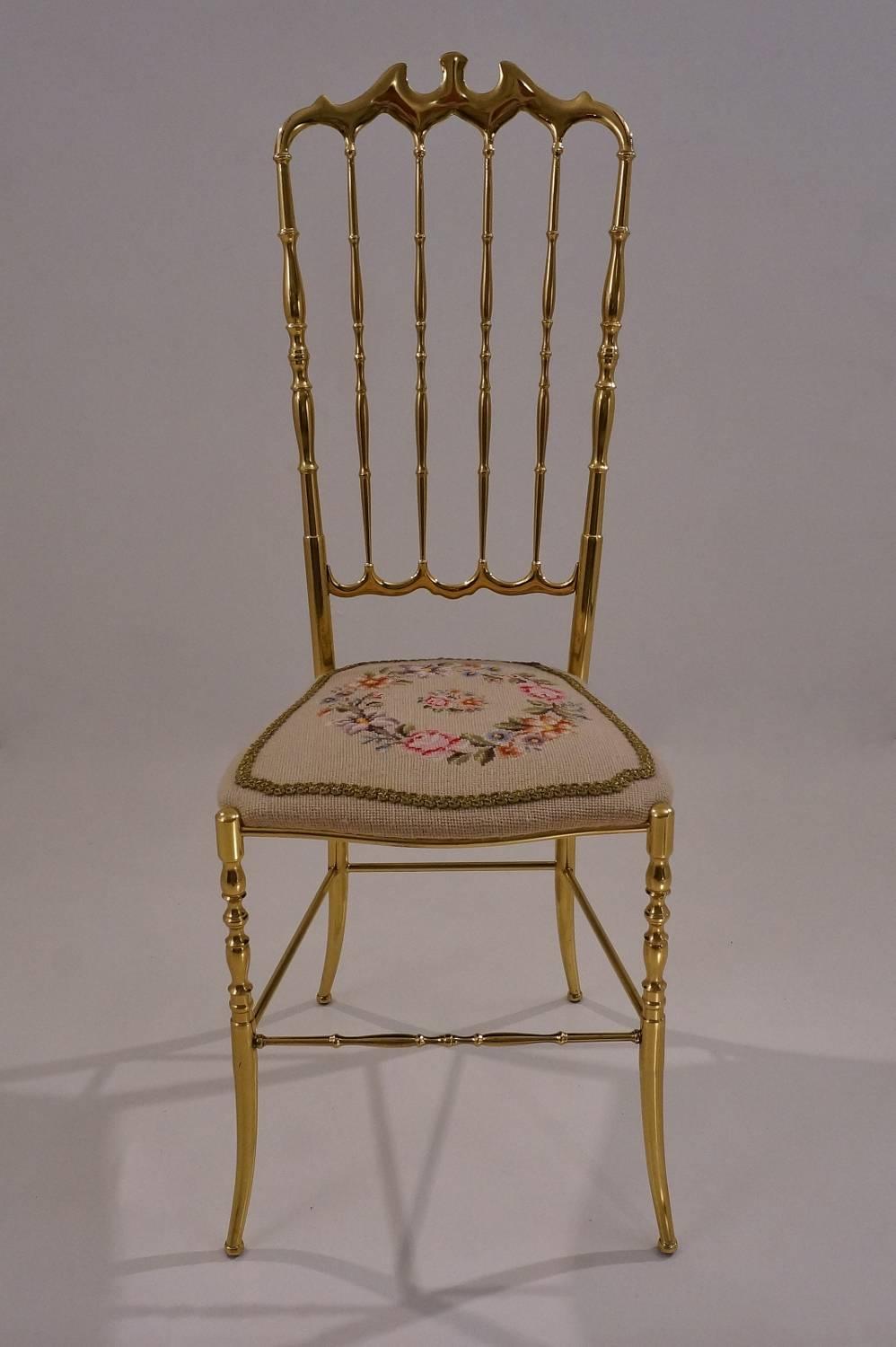 Chiavari brass chair, needle point seat with high back,1950`s ca, Italian.

This vintage chair has been thoroughly cleaned respecting the vintage patina; It is ready to use.

This elegant vintage Chiavari chair is in solid brass and has a unique
