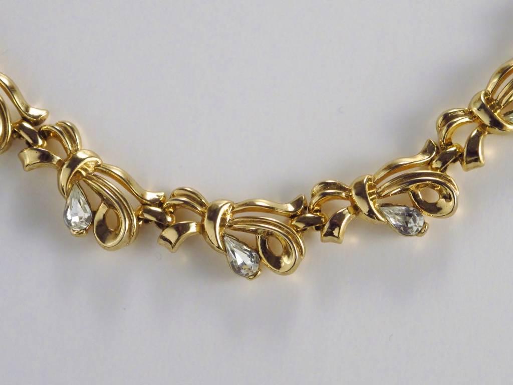 Mid-Century Modern Trifari Vintage Bow with Rhinestones Gold Tone Necklace circa 1950s, American For Sale