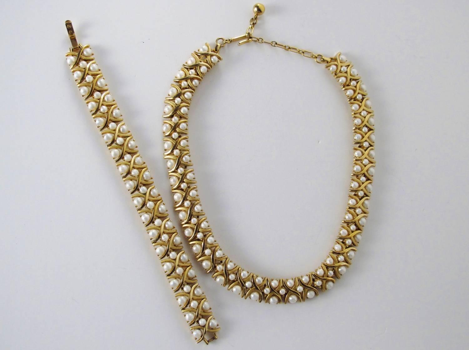Trifari vintage pearl on gold tone necklace and bracelet, circa 1950s, USA. Vintage faux pearls set in gold tone. 15