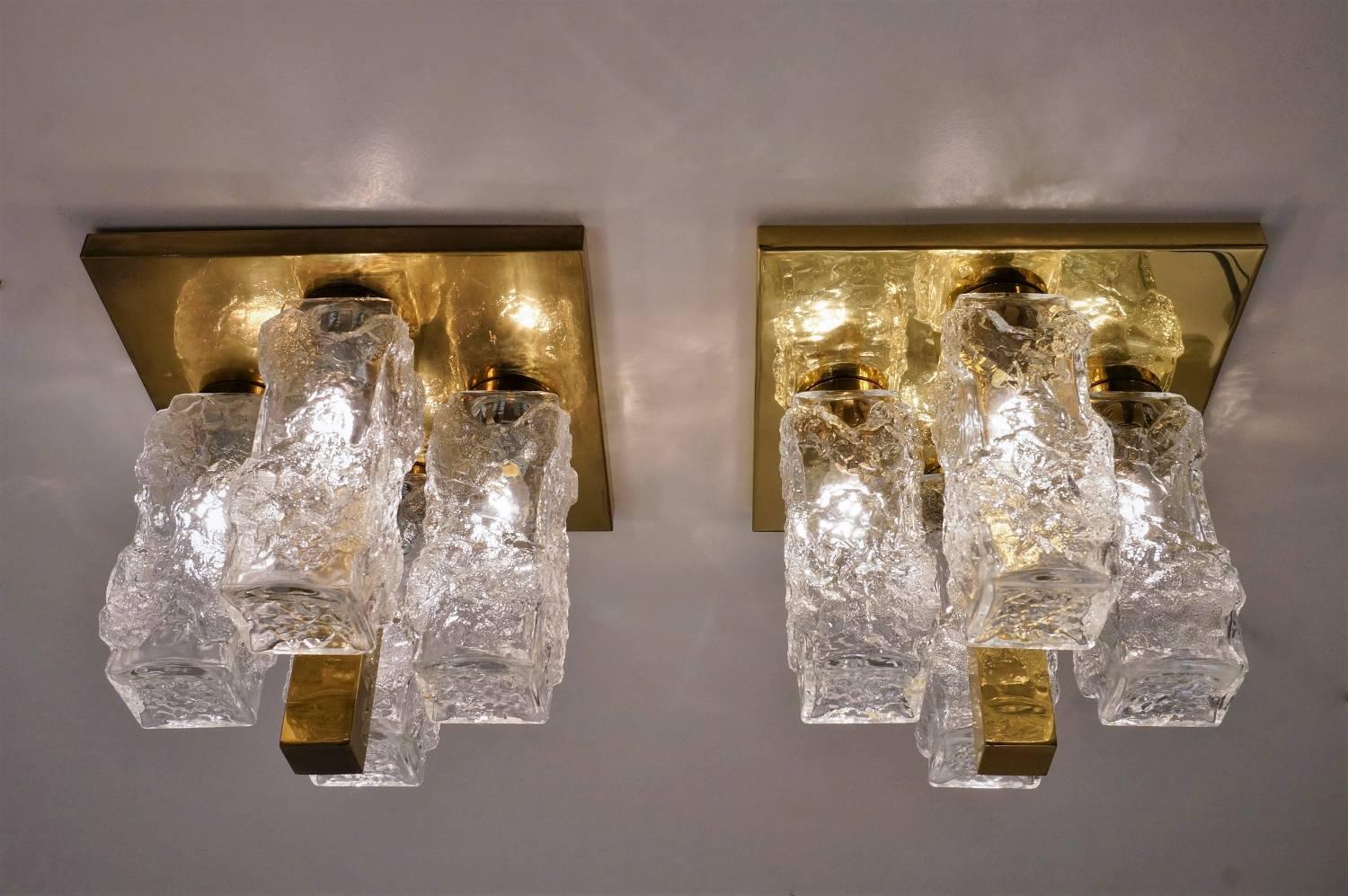 Hillebrand Lighting, pair of flush lights with Brutalist Ice glass on a brass frame, 1970`s ca, German.
Often attributed to J.T.Kalmar this design was actually produced by Hillebrand Lighting of Germany. One of the bases in this pair has the