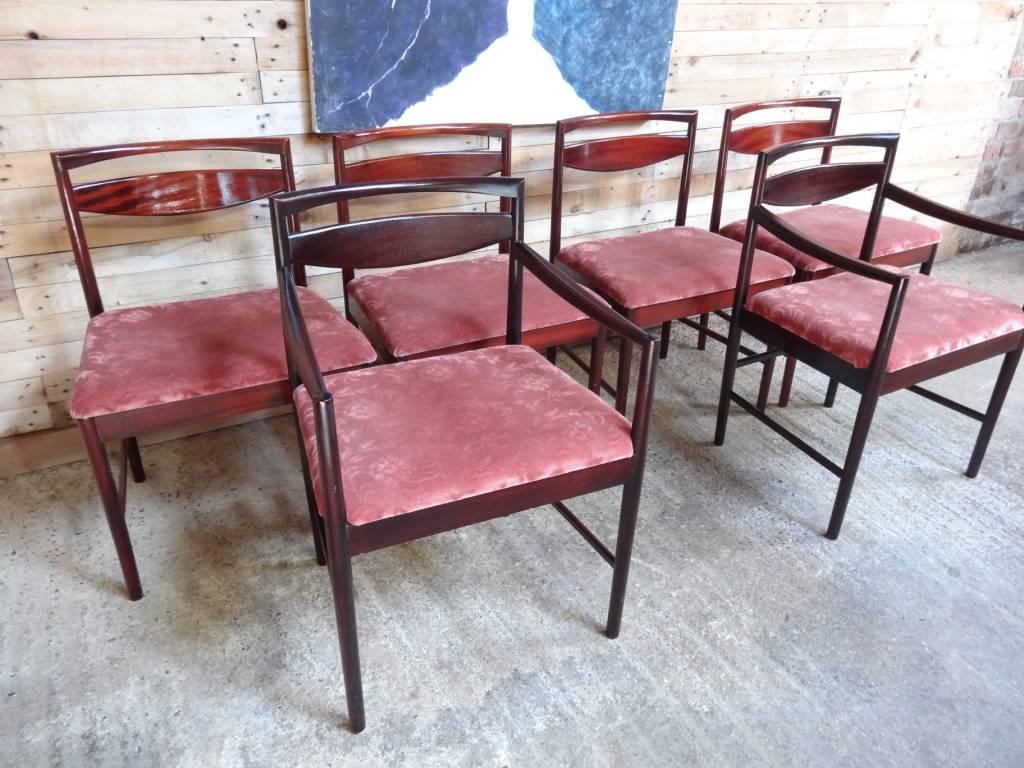 Stunning set of chairs (6) rosewood Mcintosh made and designed chairs, one of the best period furniture makers from the 1960s! The chairs are upholstered in a lovely original velvet fabric. 

 Seat height: 47cm, Height: 80cm, Depth: 50cm, Width: