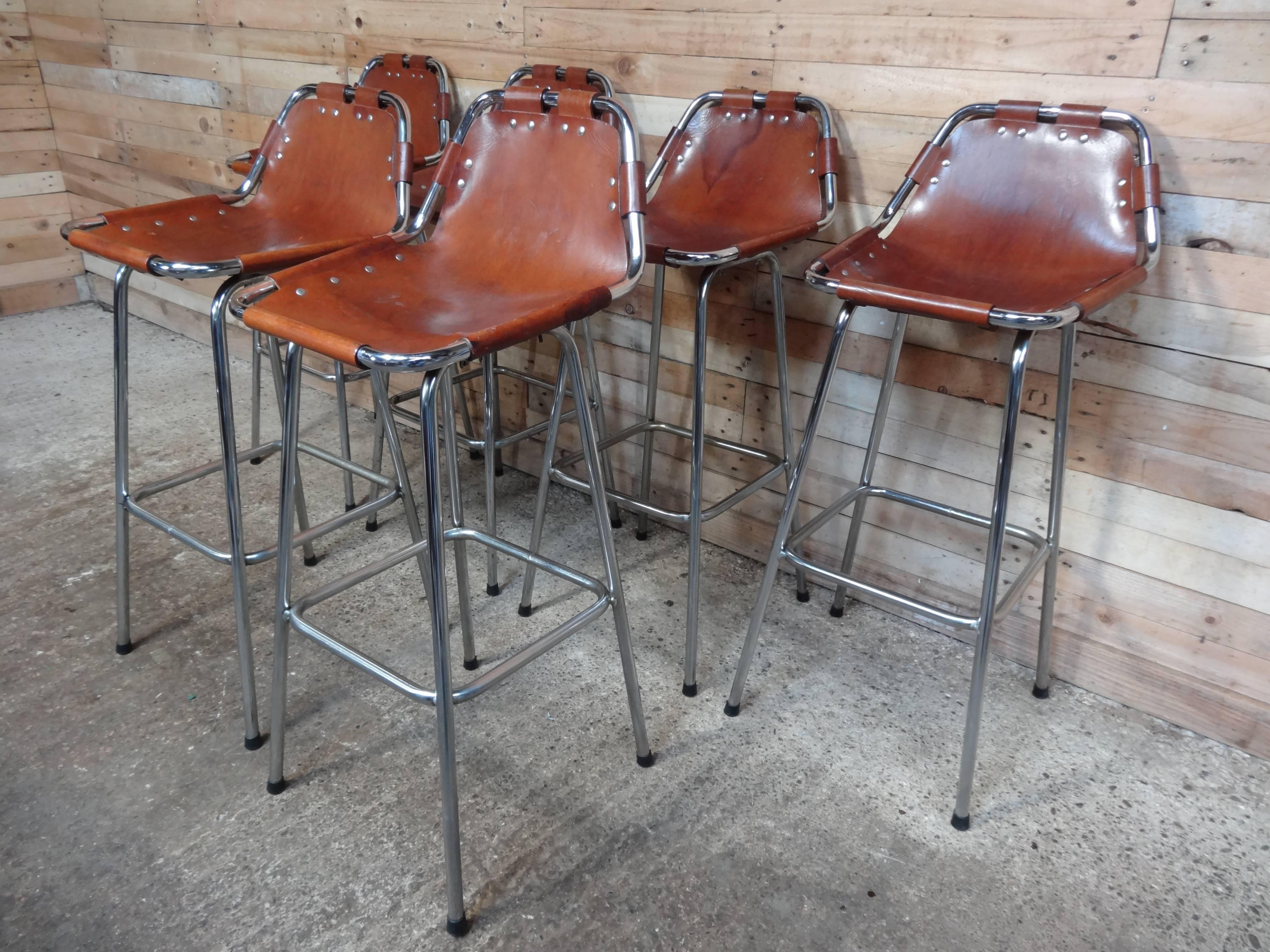 Stunning set of six stools, designer Charlotte Perriand used these in the Ski Resort Les Arcs, circa 1960. These stools were commissioned to be made by Cassina, one of the best Italian furniture maker’s very nice chrome tubular frame with thick