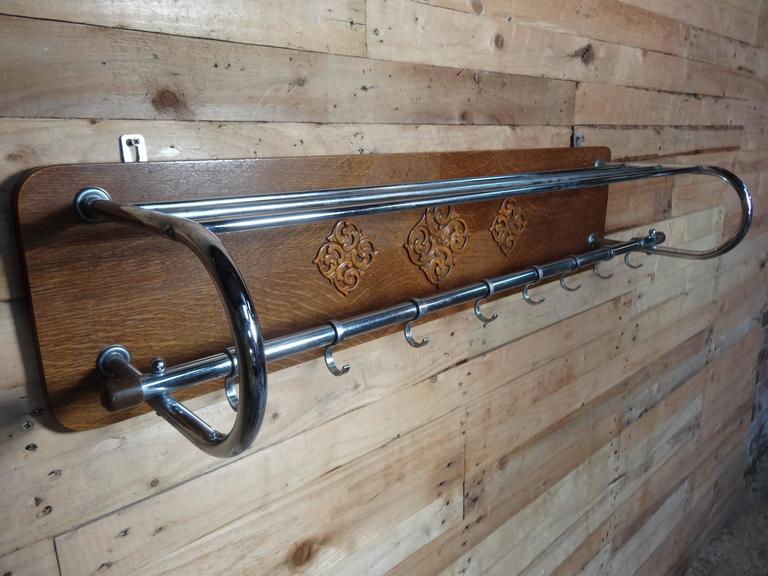Arts and Crafts Dutch Chrome and Oak Art & Craft Coatrack ca 1930 with some lovely wood carving For Sale
