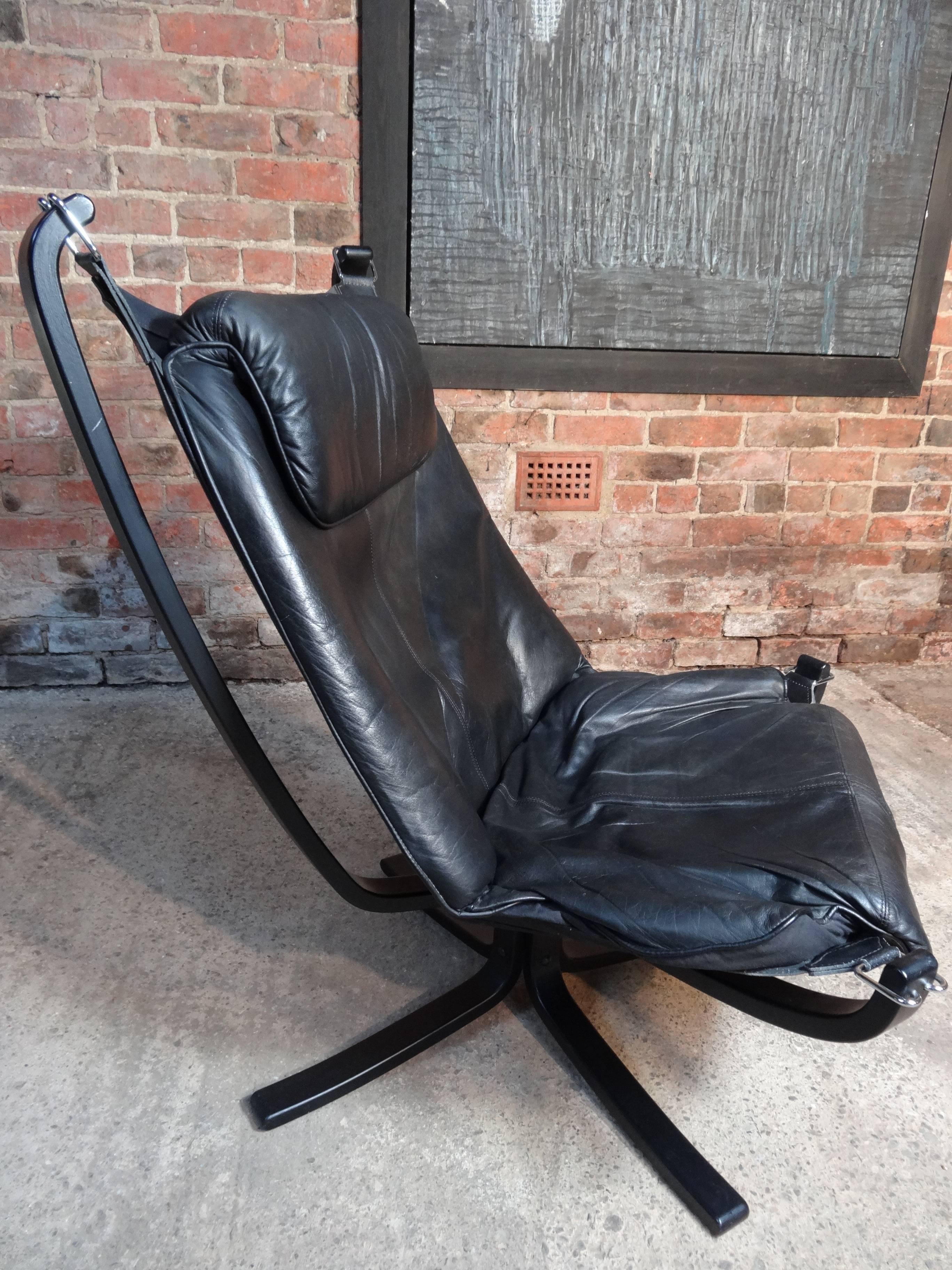 High back black leather Falcon chair made by Vatne Mobler and designed by Sigurd Resell.
Measures:
Seat height: 44 cm, height: 100 cm, depth: 85 cm, width: 78 cm.

              