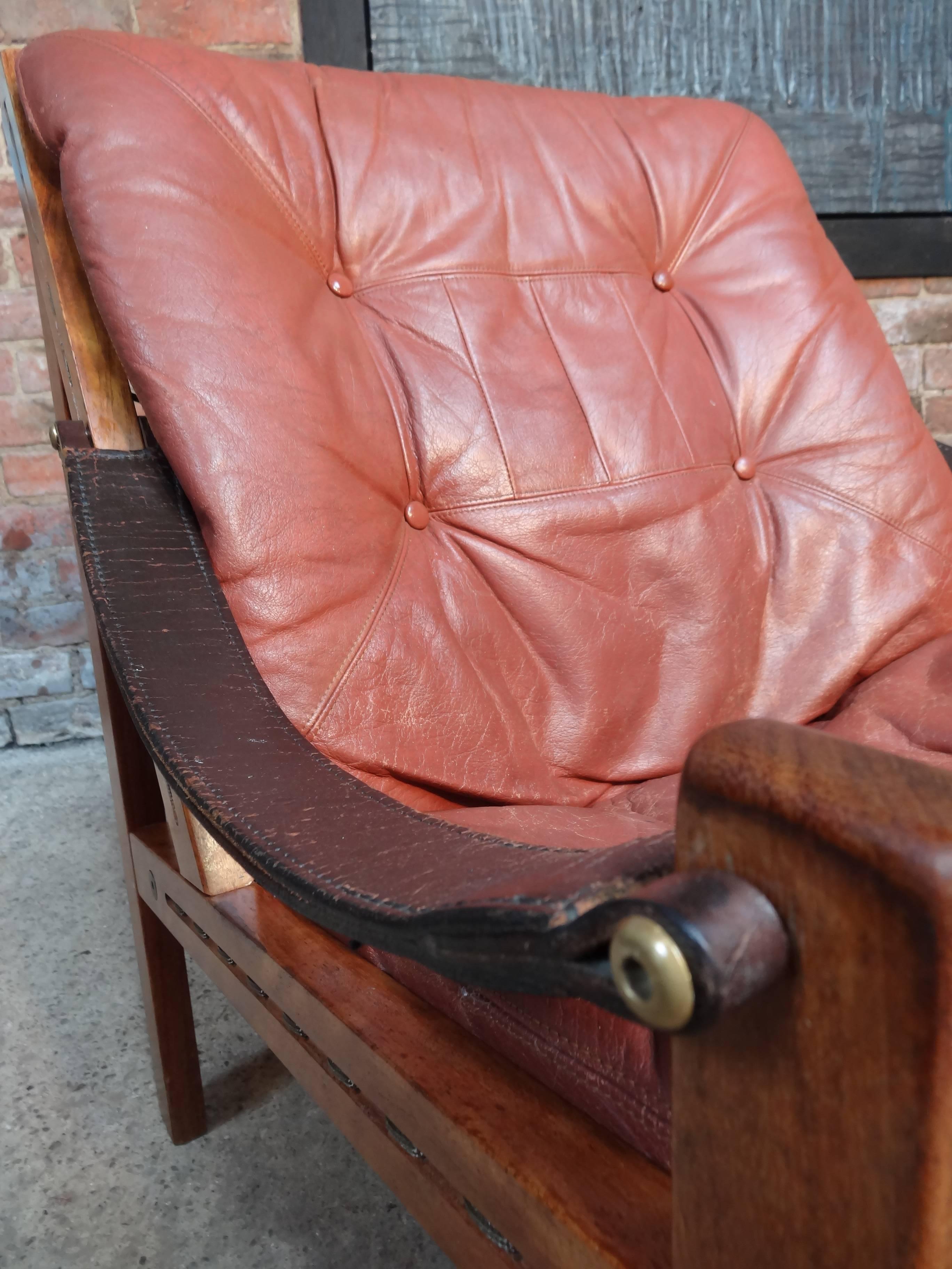 Stunning sling leather armchair designed by Torbjørn Afdal made by Bruksbo in Norway. Chair is in great vintage condition, leather has a lovely patina and is in very good condition. 

Measures: Seat height 40cm, height 80cm, depth 81cm, width 67cm.