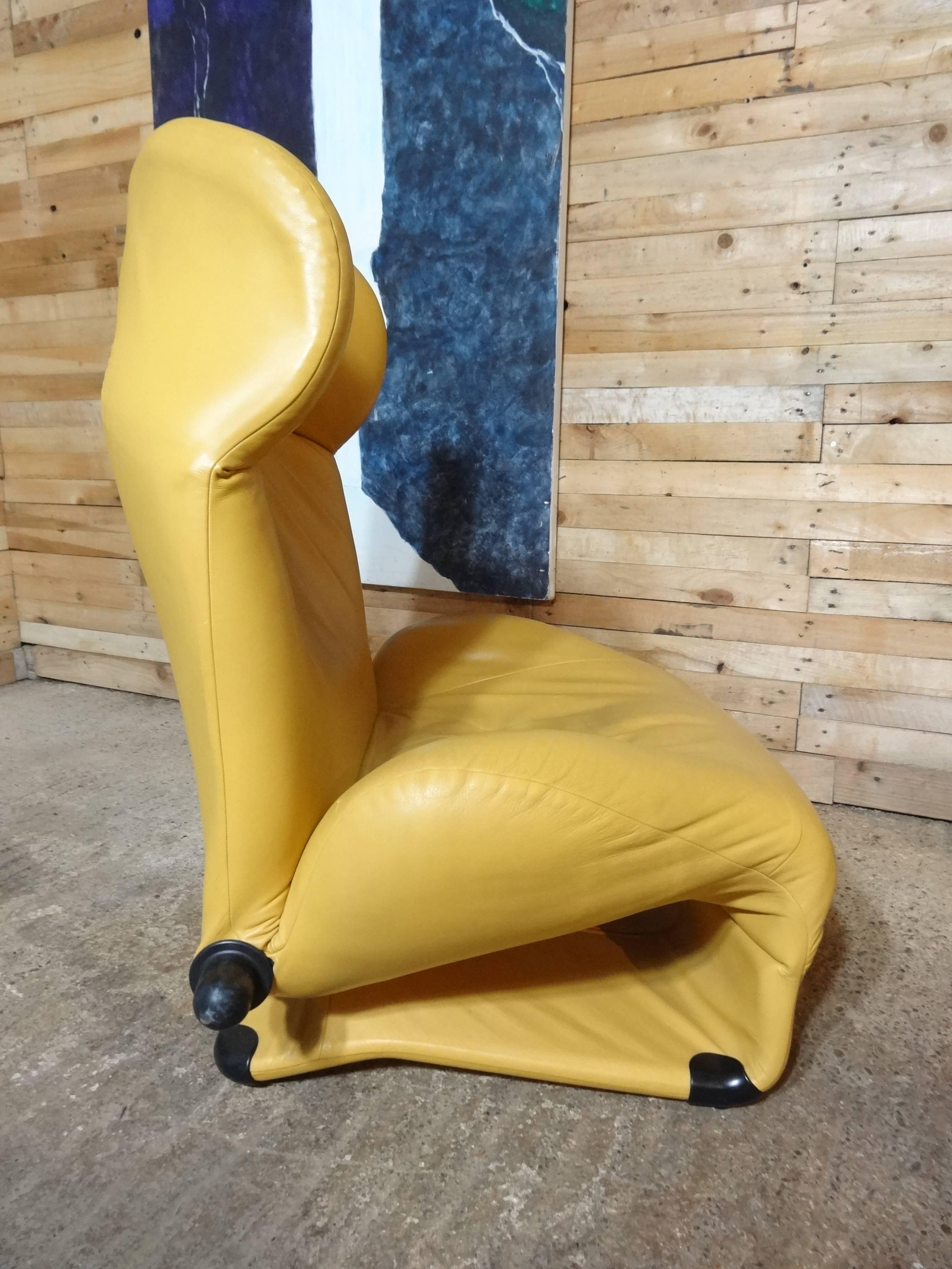 Stunning yellow leather original 1980s wink chair in very good vintage condition. Made by Cassina the ''Wink'' chair was designed by Toshiyuki Kita. The “Wink” chair was the first of a new generation of furniture aiming to provide such versatility.