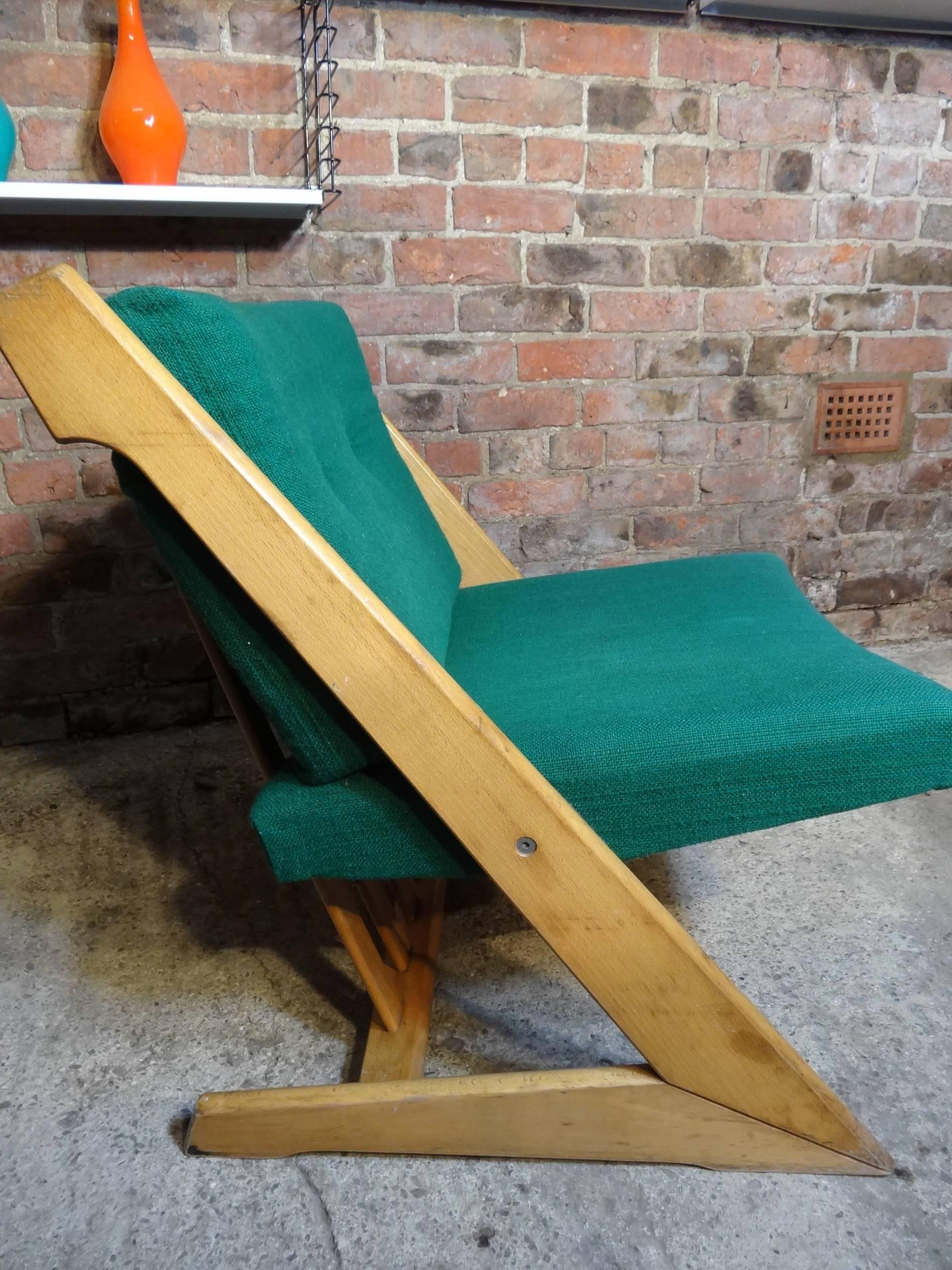 This solid Danish Z shaped framed chair comes with green fabric cushions, this classic Danish chair are the antiques of the future and look great in any decor.
Measures:
Seat height: 42 cm, height: 75 cm, depth: 70 cm, width: 62 cm.