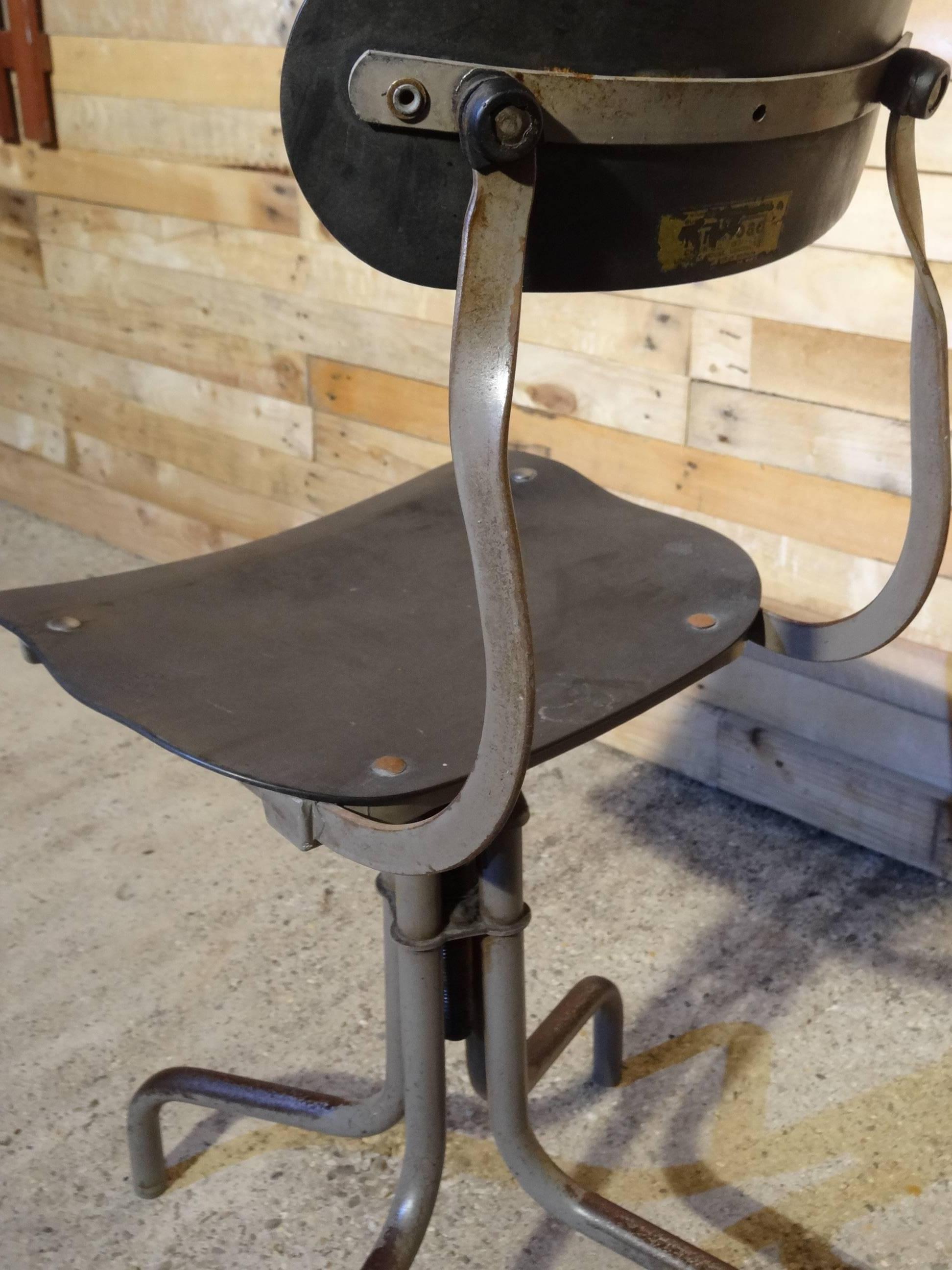 1930s Industrial sewing stool. 

Sewing stool made in the 1930s, came out of the Windsor of Woollies knitwear mill, they made clothes for the European royal families.

Seat height: 54cm, back height: 88cm, depth: 30cm, width: 30cm.