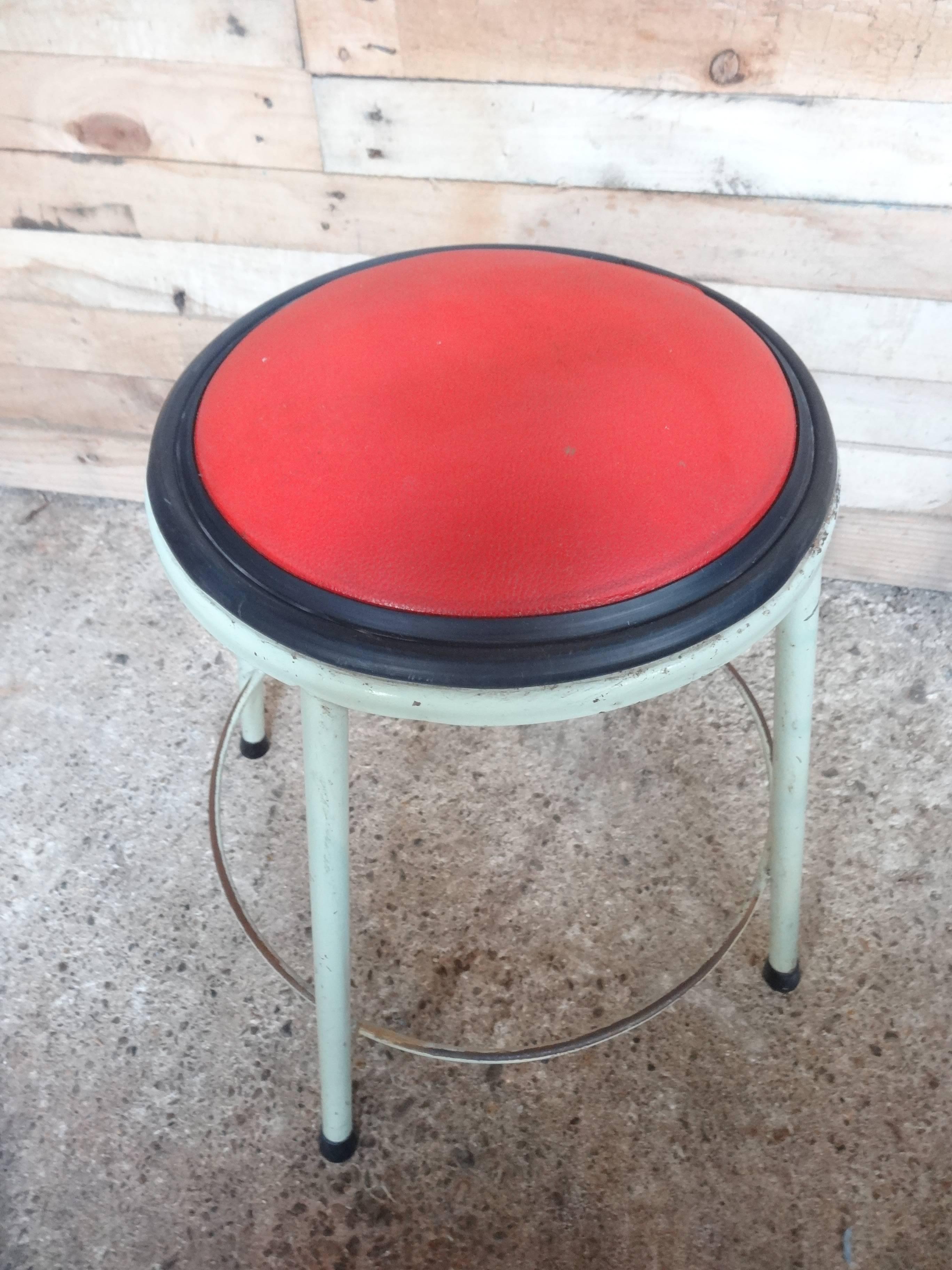 red metal stool