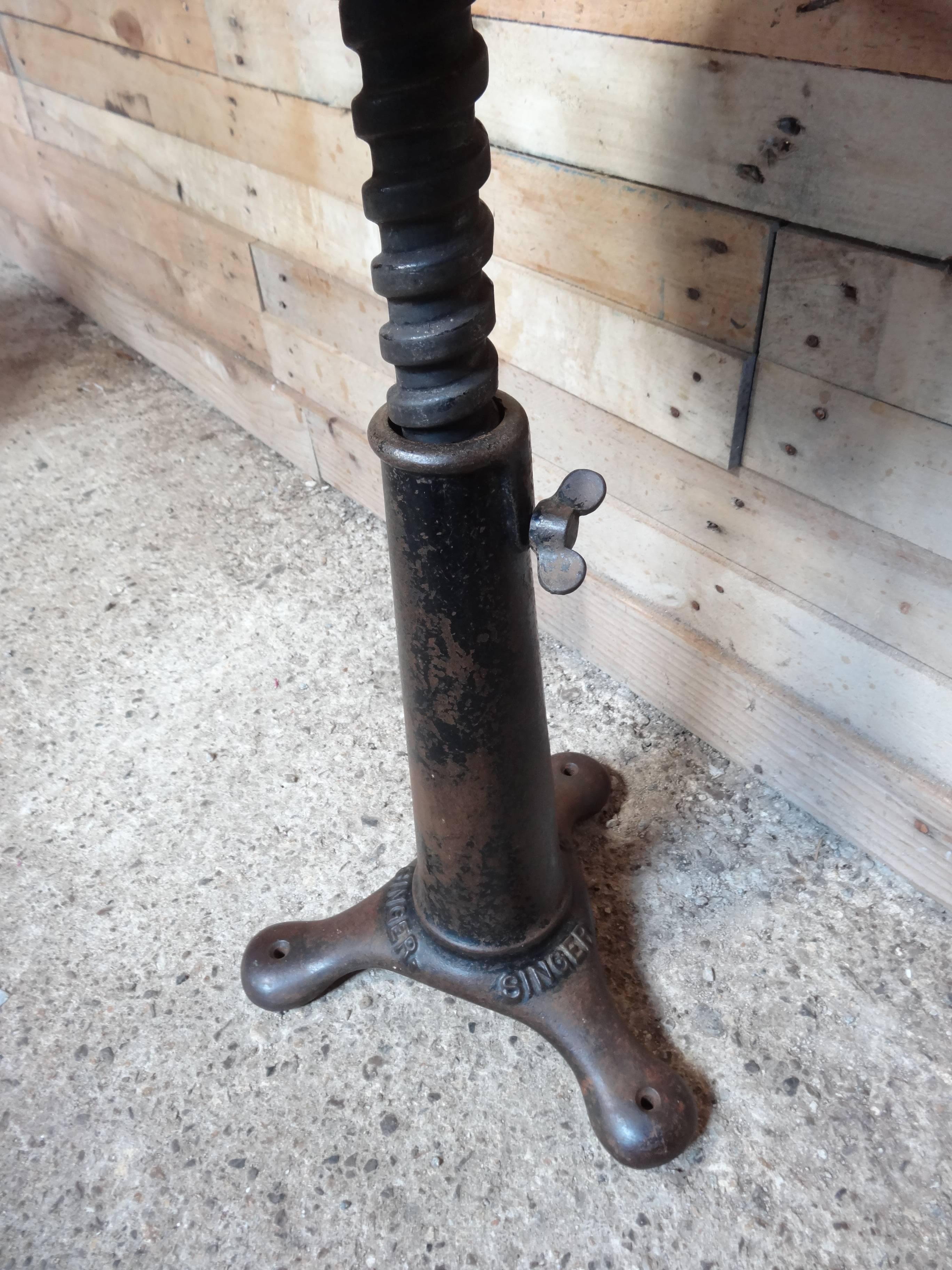 Singer cast iron vintage Industrial stool

Measures: H 44 / 63cm, D 30cm, W 30cm.