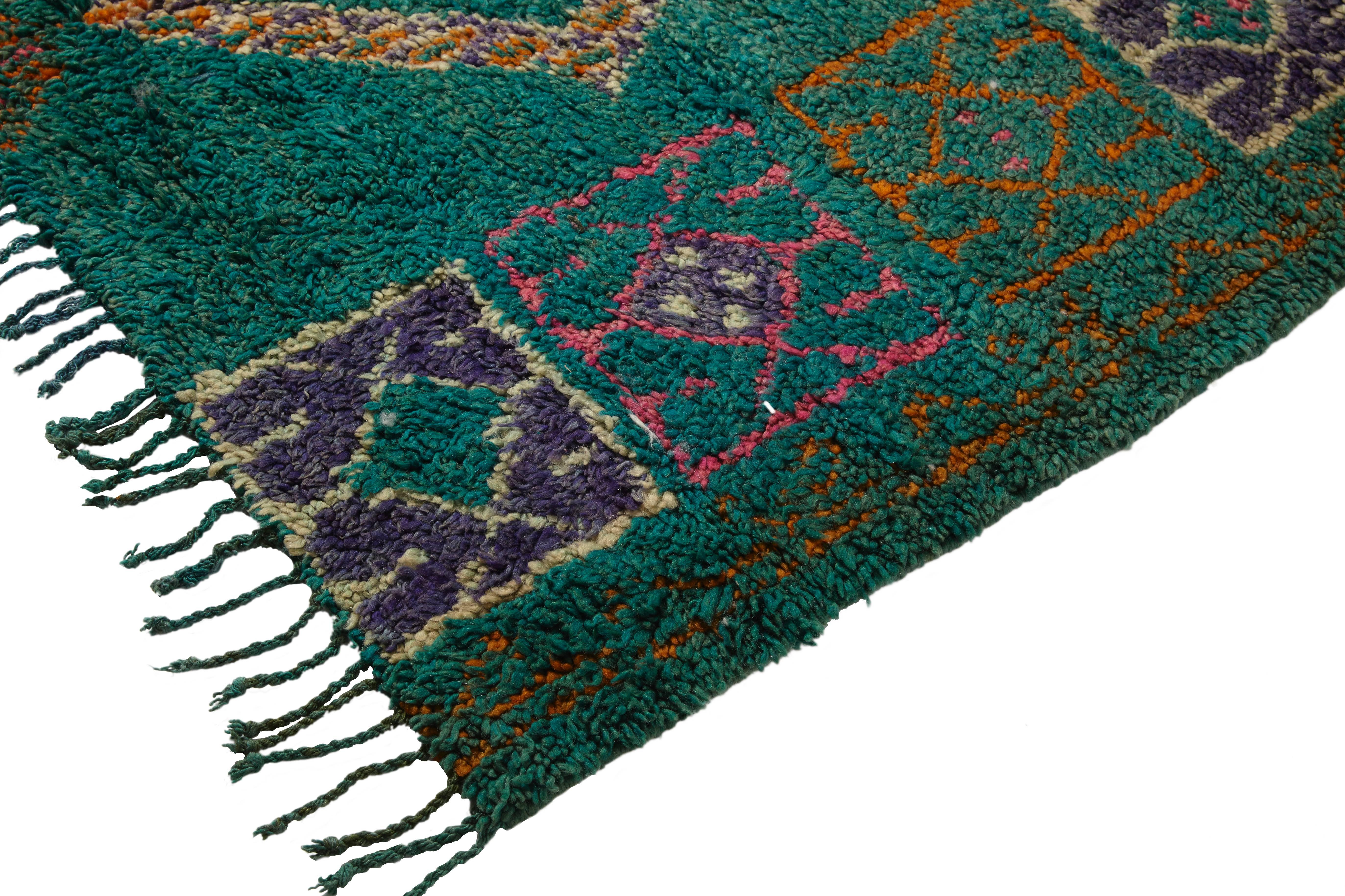 Boujad rug,
Middle Atlas Mountains,
Morocco,
Late 20th century.
Wool, Pile rug
Emerald green, rare colours.

Measures: 327 x 151 cm.

Late 20th century Boujad rug handwoven with a thick pile of wool in mainly green colouring with small