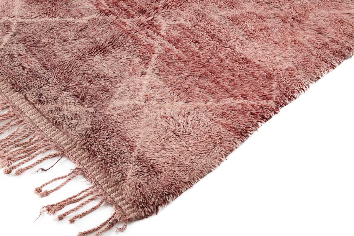 Beni Ouarain rug,
Morocco,
Wool, thick pile,
New production

Measures: 358 x 268cm

This is a new production rug, hand-knotted in the style of Moroccan Beni Ouarain rugs. It is woven with a thick, heavy weighted, soft pile of wool and is in