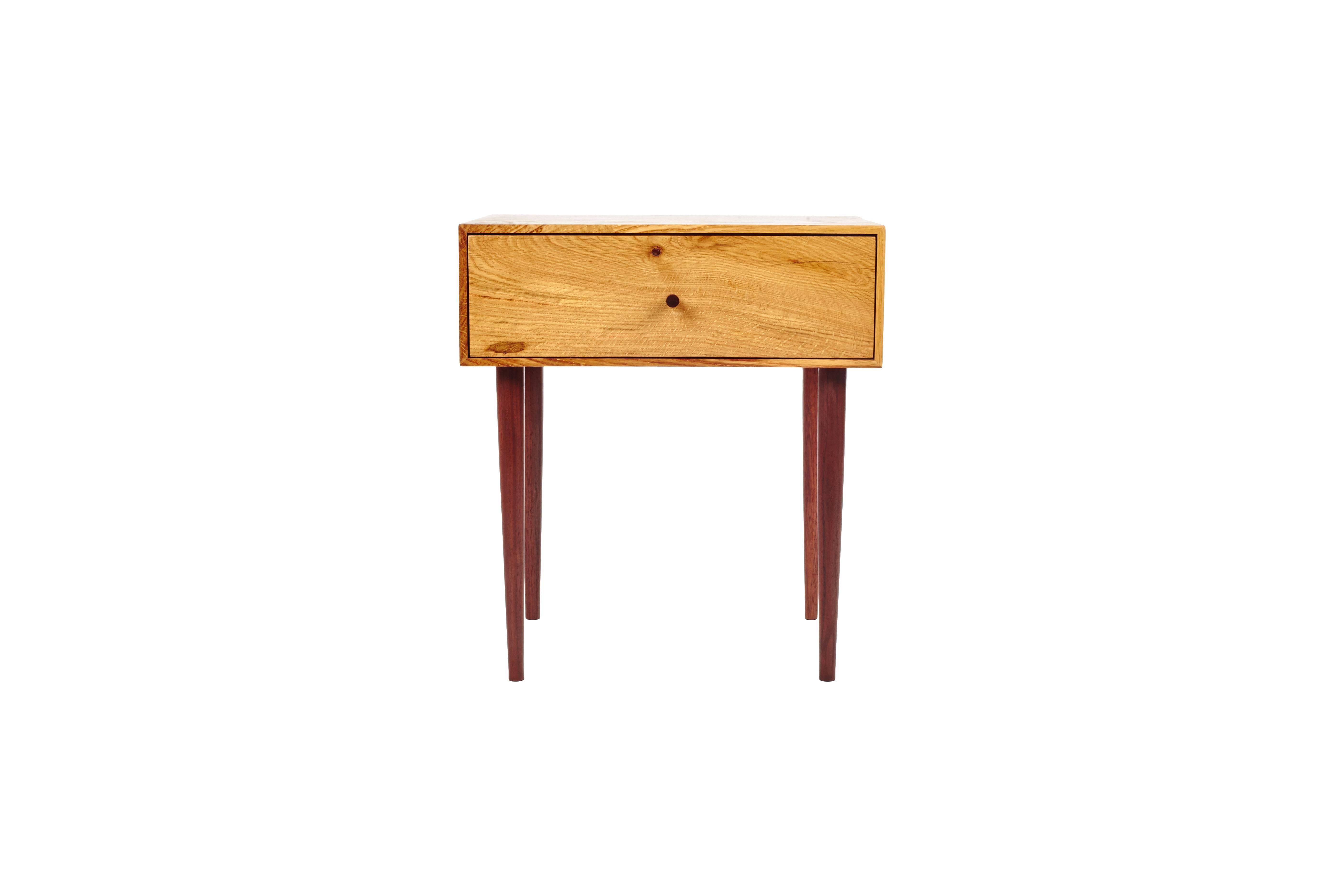 Two Sisters End Table, Edition of 8. Each Chestnut Oak case is comprised of an inch thick single board, which, with mitered corners, wraps around each piece. Every knot and whorl is carefully considered as we select the orientation of the board