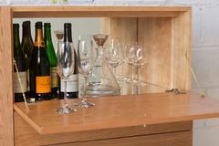 Rex Sideboard in Cherry-wood with Hand Spun Gold Pulls and Drop-down Mirror