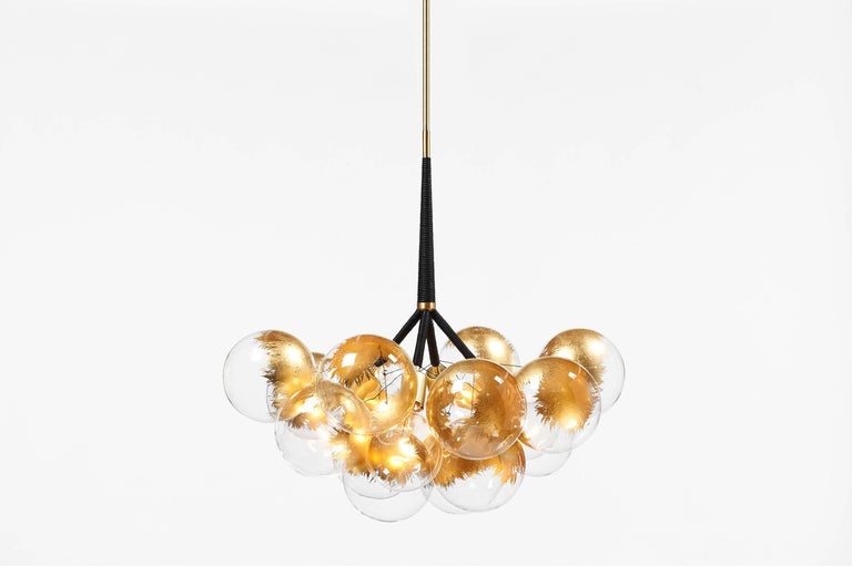 Ethereal and iconic, the bubble chandelier is a modern re-interpretation of the crystal chandelier. Its luminous constellation of delicate glass globes adds beauty and depth to any interior environment.

Based on an original design first conceived