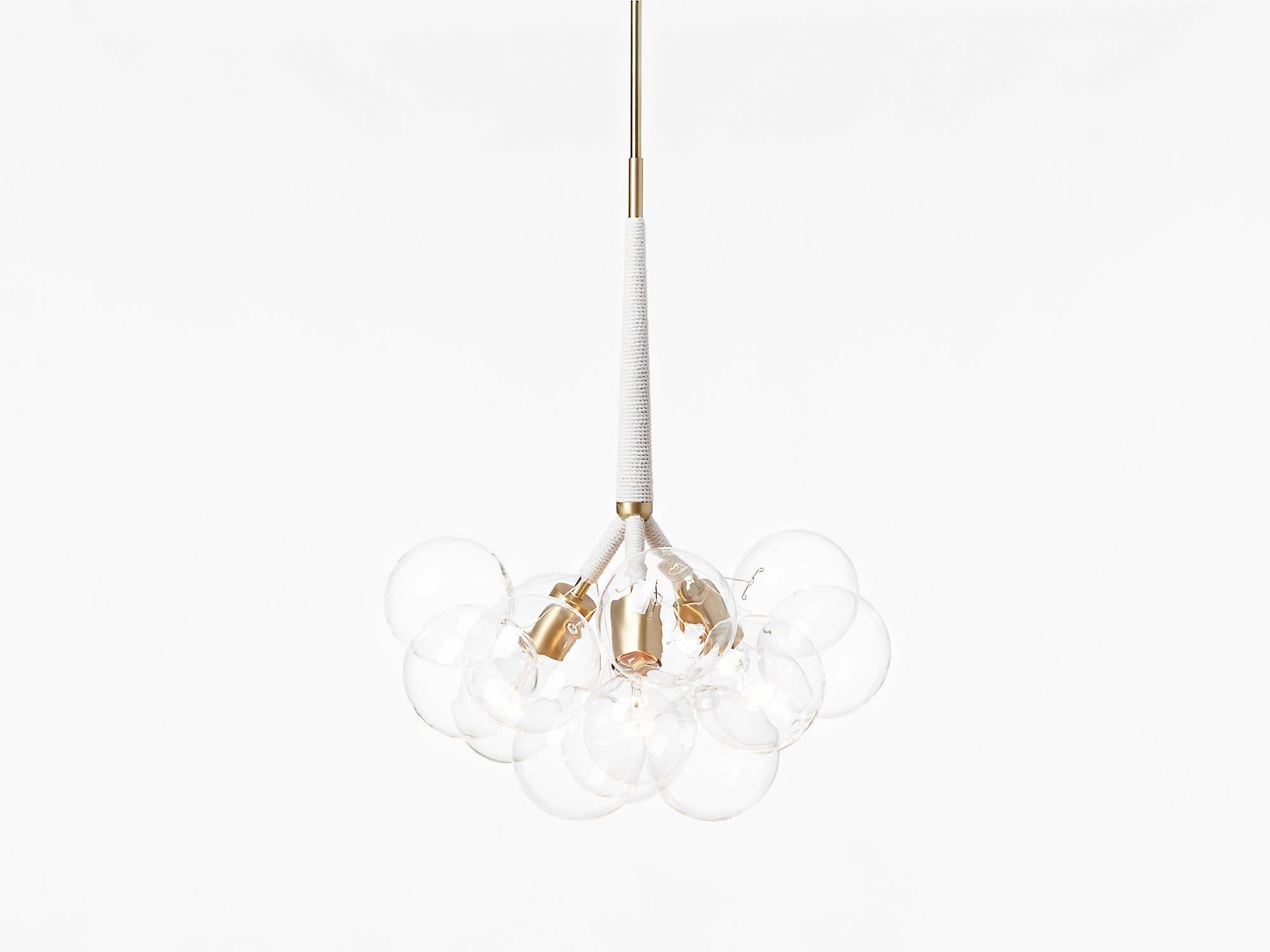 Ethereal and iconic, the Bubble chandelier is a modern re-interpretation of the crystal chandelier. Its luminous constellation of delicate glass globes adds beauty and depth to any interior environment.

Based on an original design first conceived