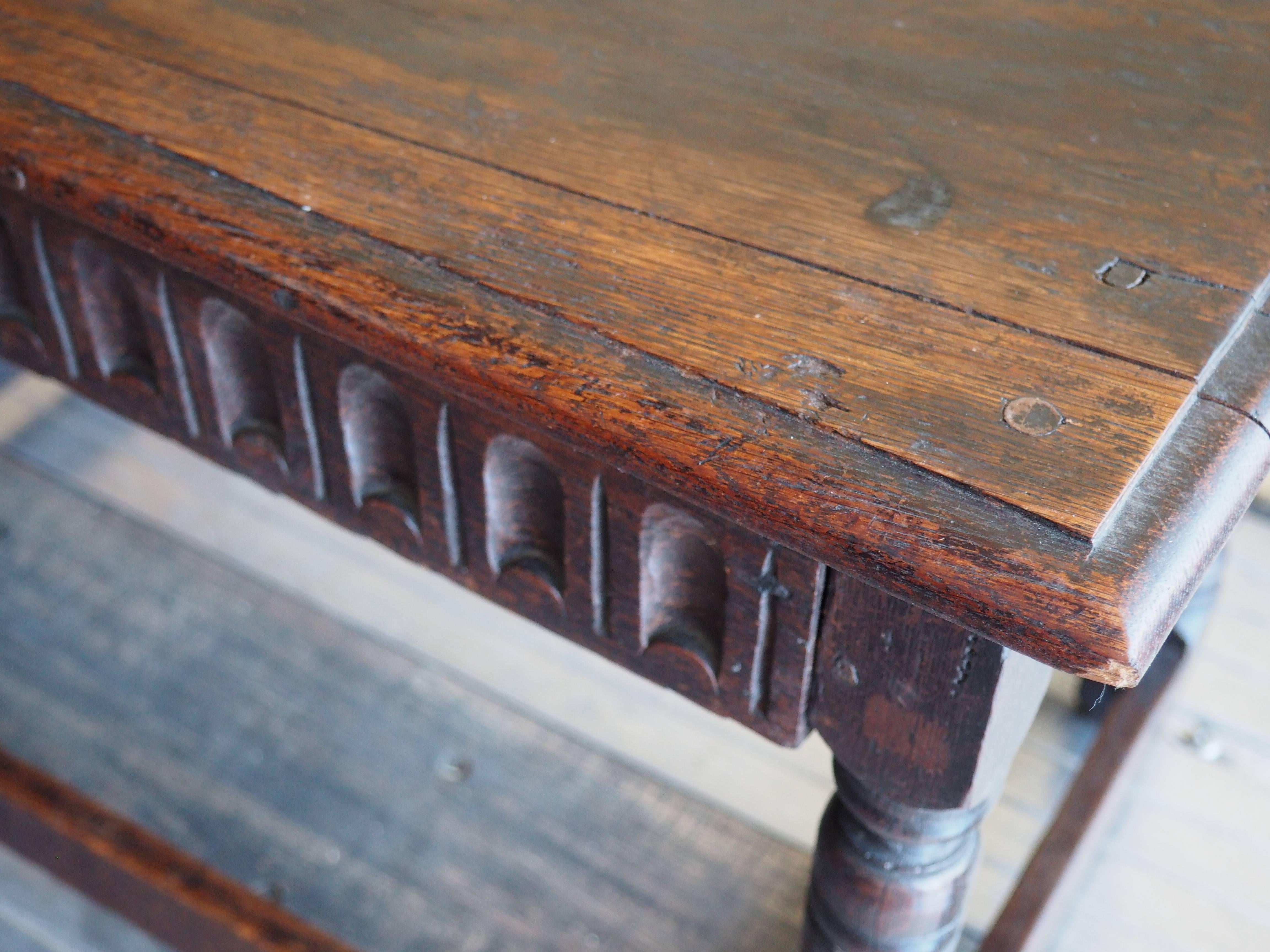This Antique bench table with drawer from the 1700s is a very usable size for many applications.