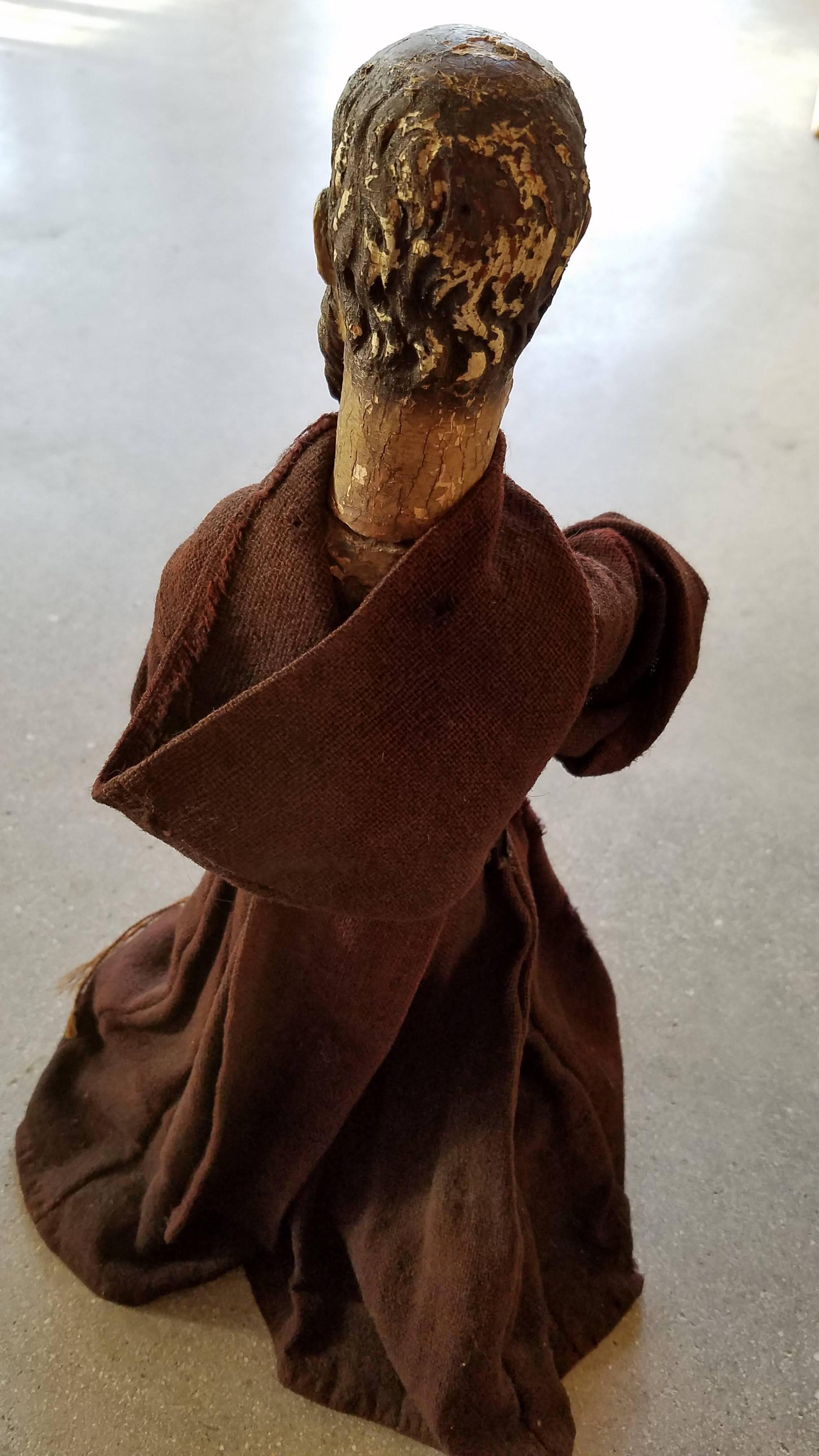 Antique Carved Monk Statue with Original Cloth Garments and Wood Beaded Belt In Fair Condition In Cardiff, CA