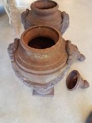 Pair of 19th Century Cast Iron Lidded Urns with Swags and Satyr Mask