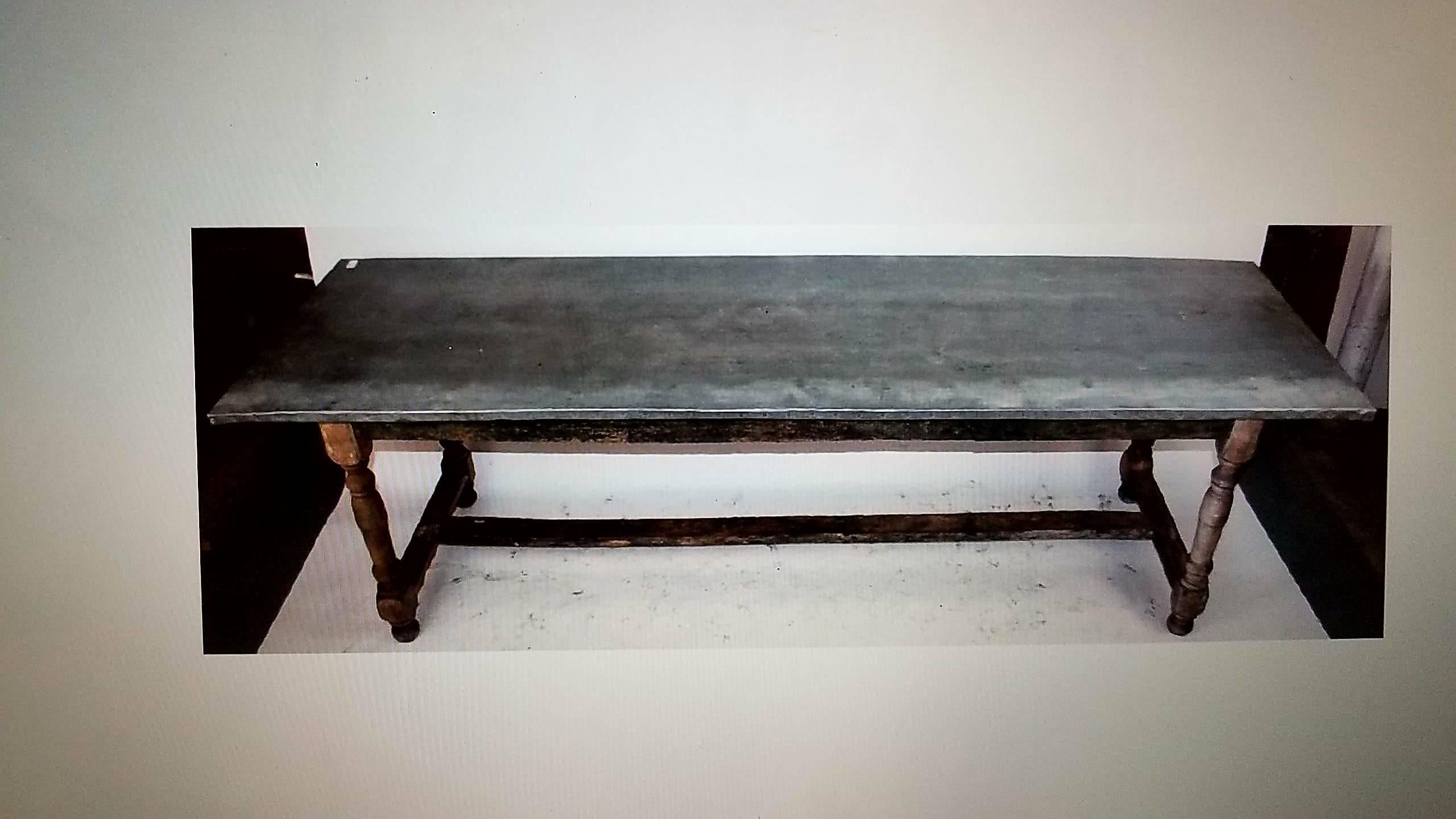 Beautiful antique trestle potting table has so much potential for many uses. Great condition with some waffling of the zinc top.
  