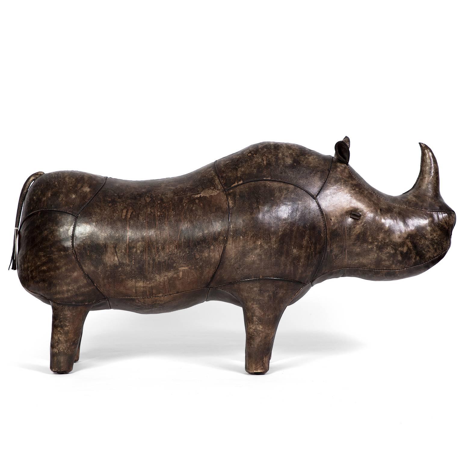 Since 1927, British company Omersa has made handcrafted leather animal footstools. In the 1960s, Abercrombie & Fitch commissioned a series of leather rhinos to use as display pieces in their American stores. An iconic Vogue photo shows Edie