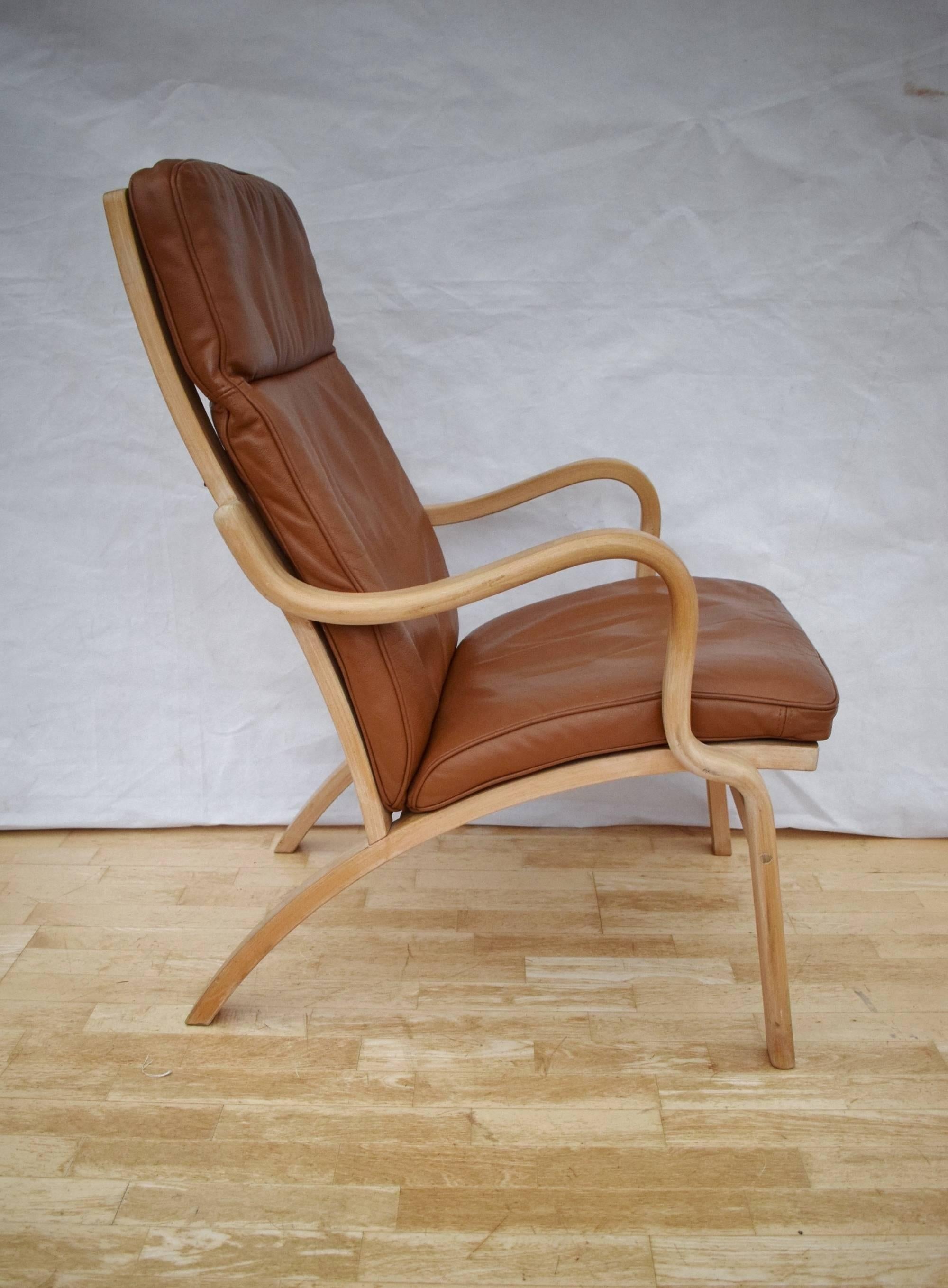 Mid-Century Modern Mid-Century Retro Danish Bentwood Tan Leather Armchair and Footstool by Stouby