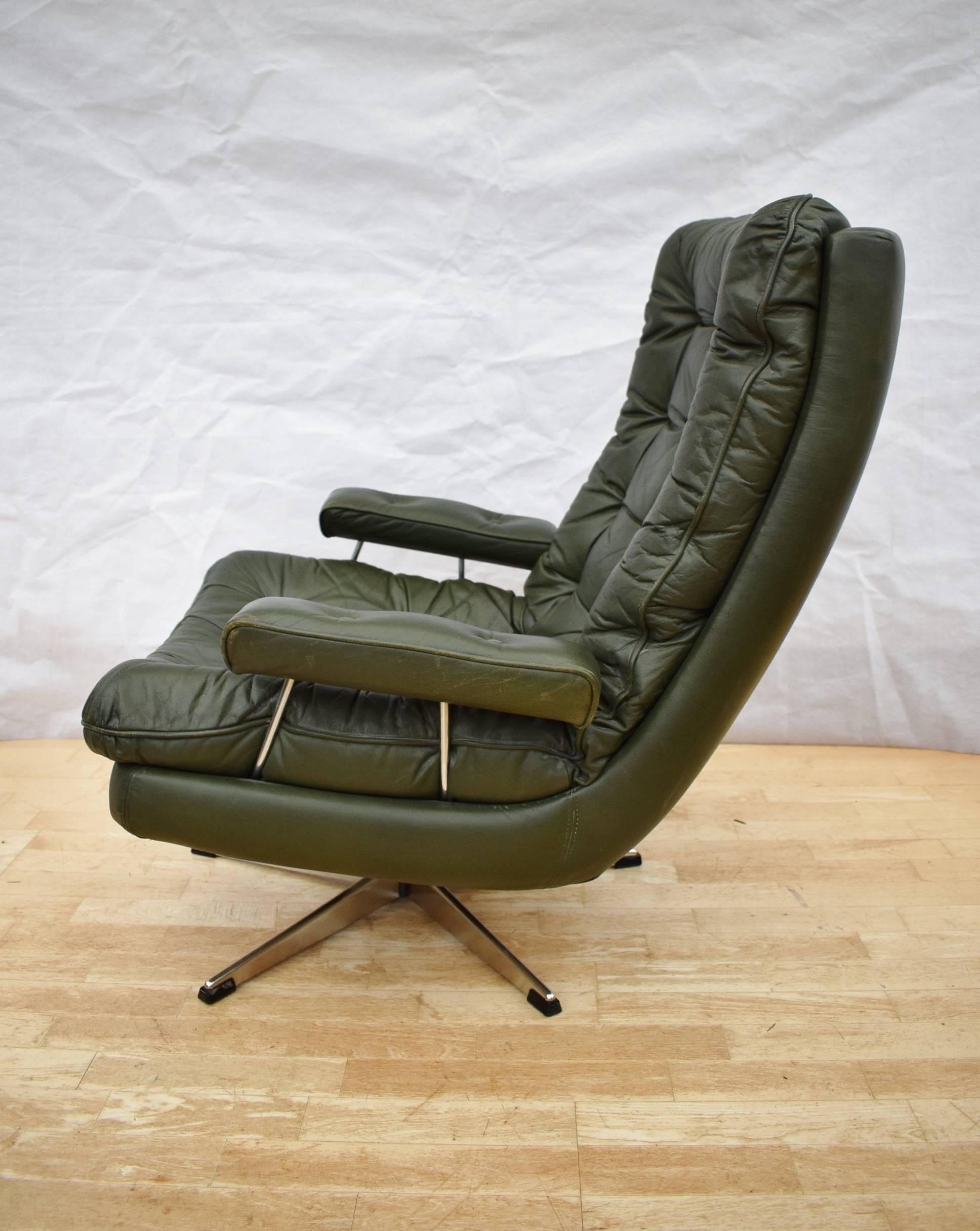 Designer: Danish Design.

Manufacturer: Unknown.

Country: Denmark.

Date: 1970s.

Material: Genuine Green leather upholstery with metal swivel base.

Maximum Dimensions: Width 77cm, depth 90cm, height 90cm and seat height