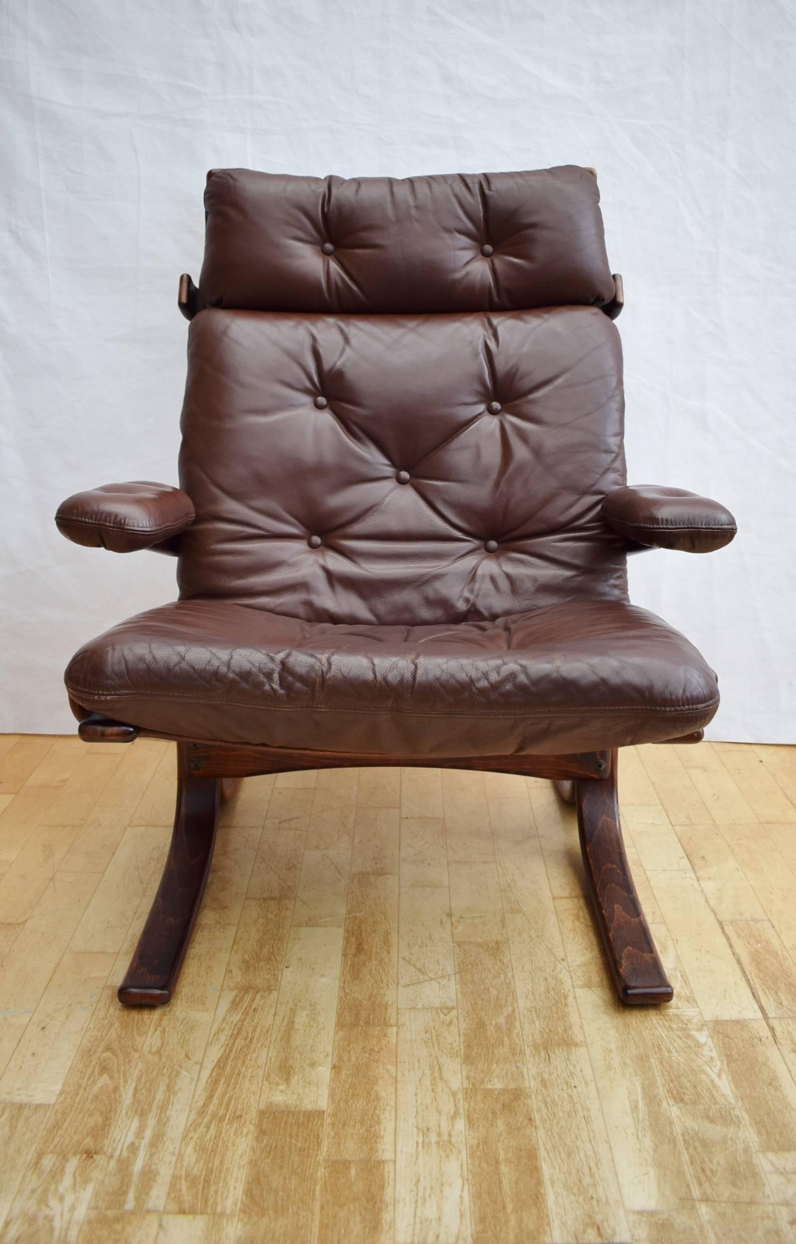 Designer: Norwegian Design

Manufacturer: Westnofa

Country: Norway

Date: 1970s

Material: Beechwood frame with genuine brown leather upholstery

Maximum dimensions: Width 82cm, depth 80cm, height 94cm and seat height 44cm

Condition: