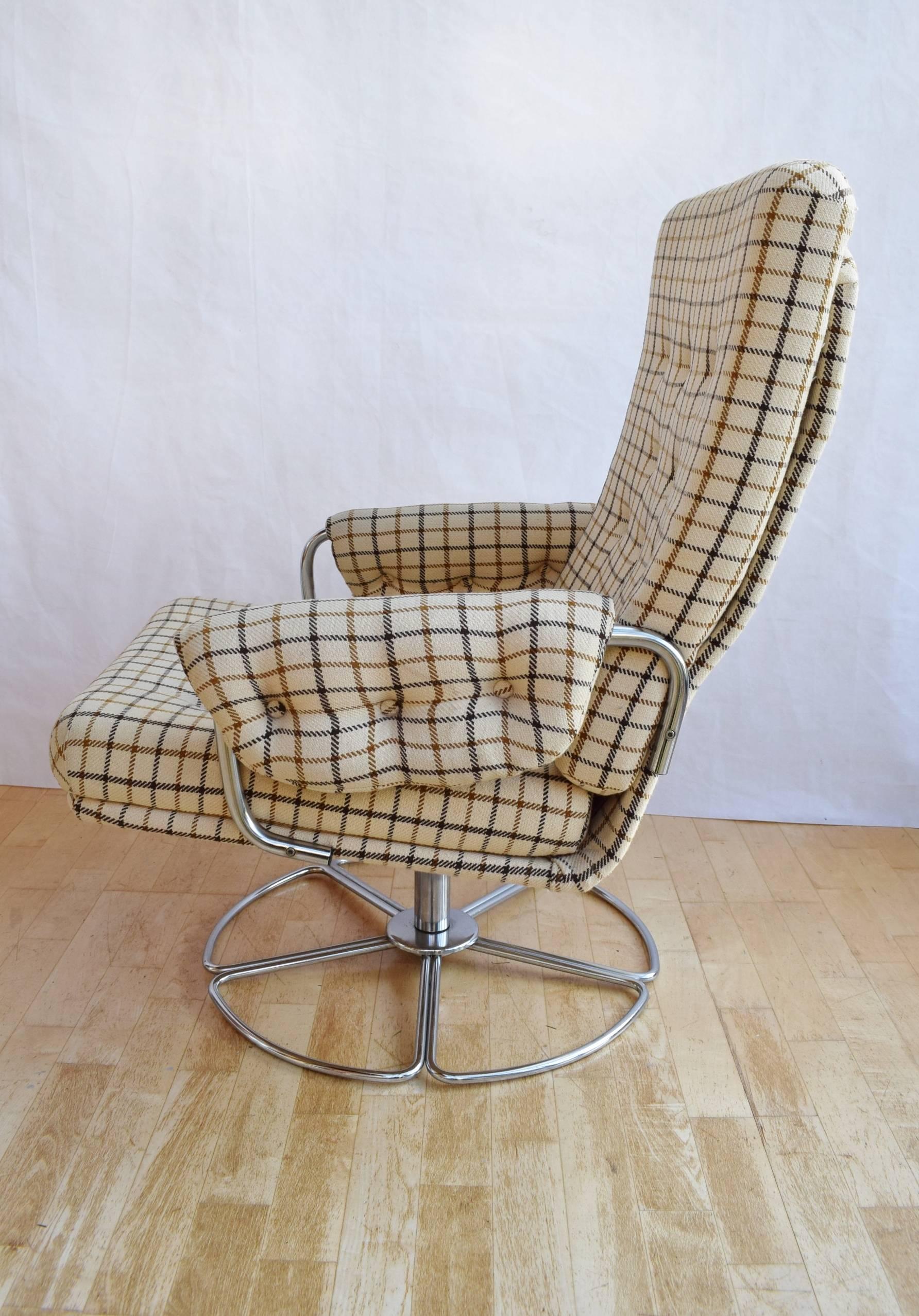 Designer: Danish Design

Manufacturer: Unknown

Country: Denmark

Date: 1970s

Material: Metal frame and swivel base with patterned wool upholstery

Maximum dimensions: Width 77cm, depth 84cm, height 92cm and seat height 41cm

Condition: