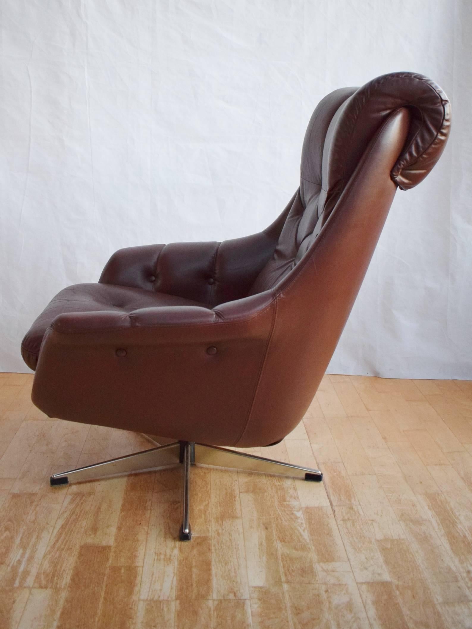 Designer: Danish Design

Manufacturer: Unknown

Country: Denmark

Date: 1970s

Material: Tan brown leather with metal swivel base

Maximum Dimensions: Width 80cm, depth 93cm, height 94cm and seat height 42cm

Condition: Very good, with