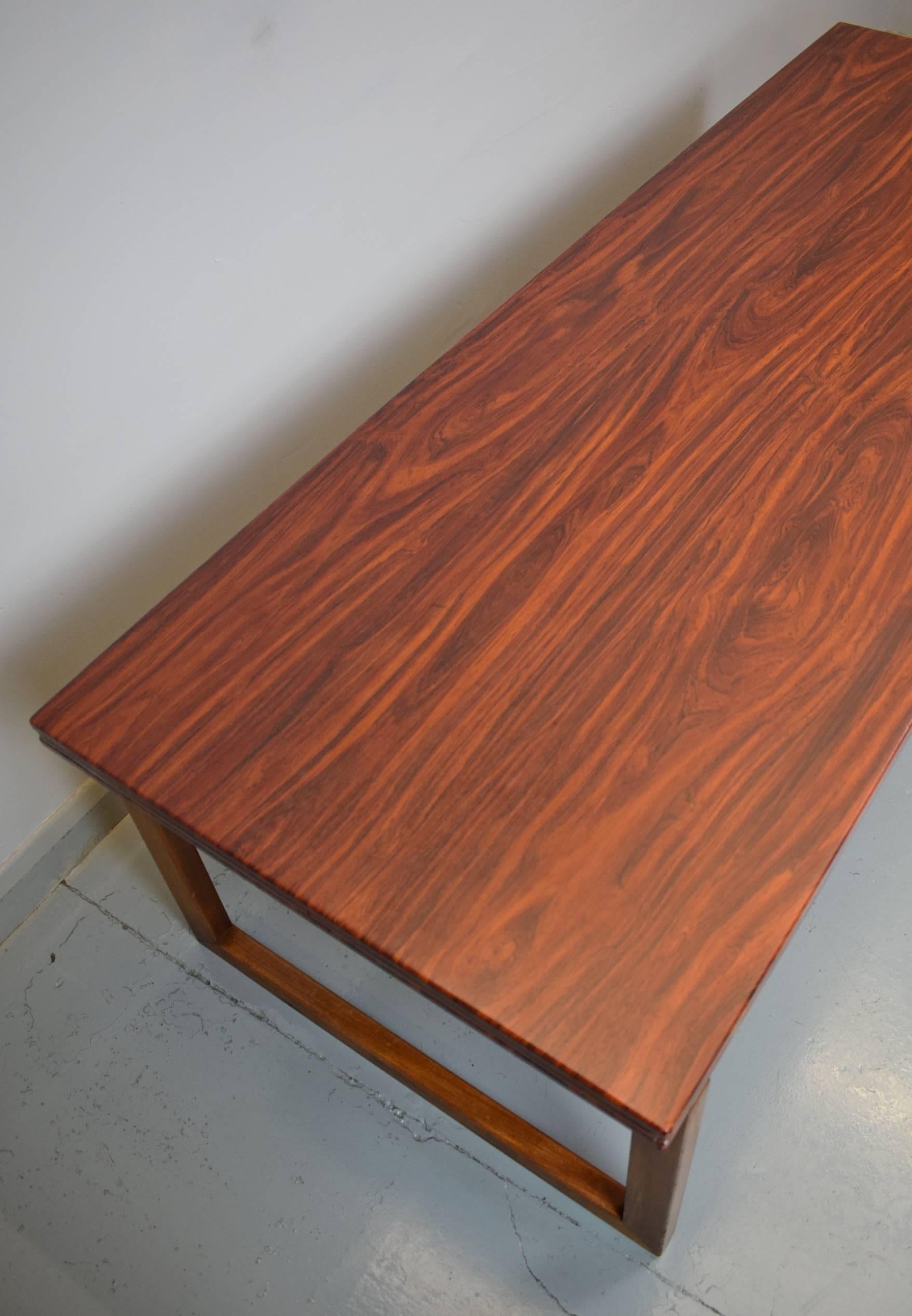 Designer: Danish design

Manufacturer: Anton Kildeberg Møbelfabrik

Country: Denmark

Date: 1970s

Material: Rosewood laminate with beechwood frame

Maximum dimensions: Width 170cm, depth 65cm and height 50cm

Condition: Excellent with