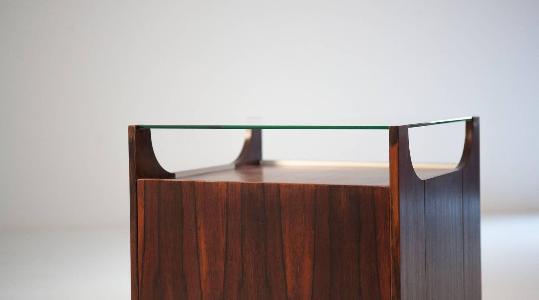 Table bar called ''cubobar'' designed by Bruno Munari in 1962 for Stildomus.
This is a rare first version in rosewood where the later editions was only Lacquered.
The piece is fully restored.