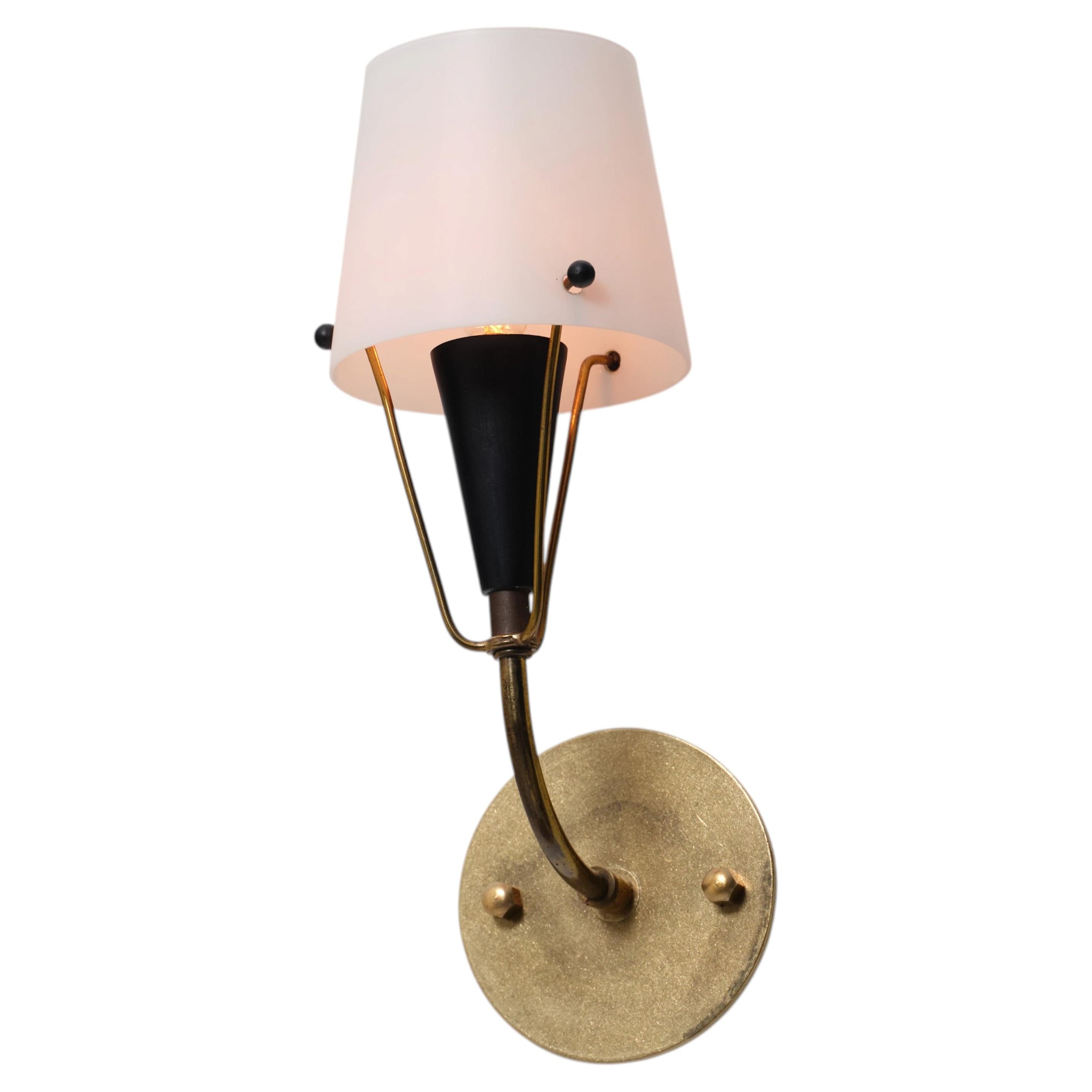 What is the difference between a lamp and a light?