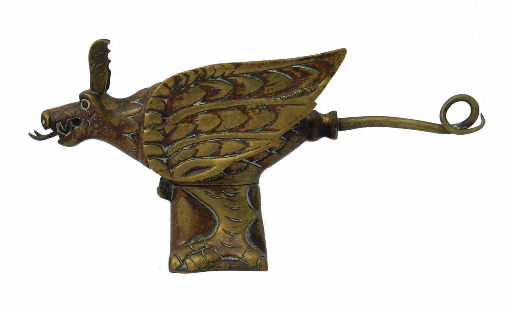 Brass inkwell curious dragon, bird late 19th century early 20th century
Unusual fantasy creature novelty inkwell
No liner
Good antique condition with signs of age and remnants of years of cleaning


 