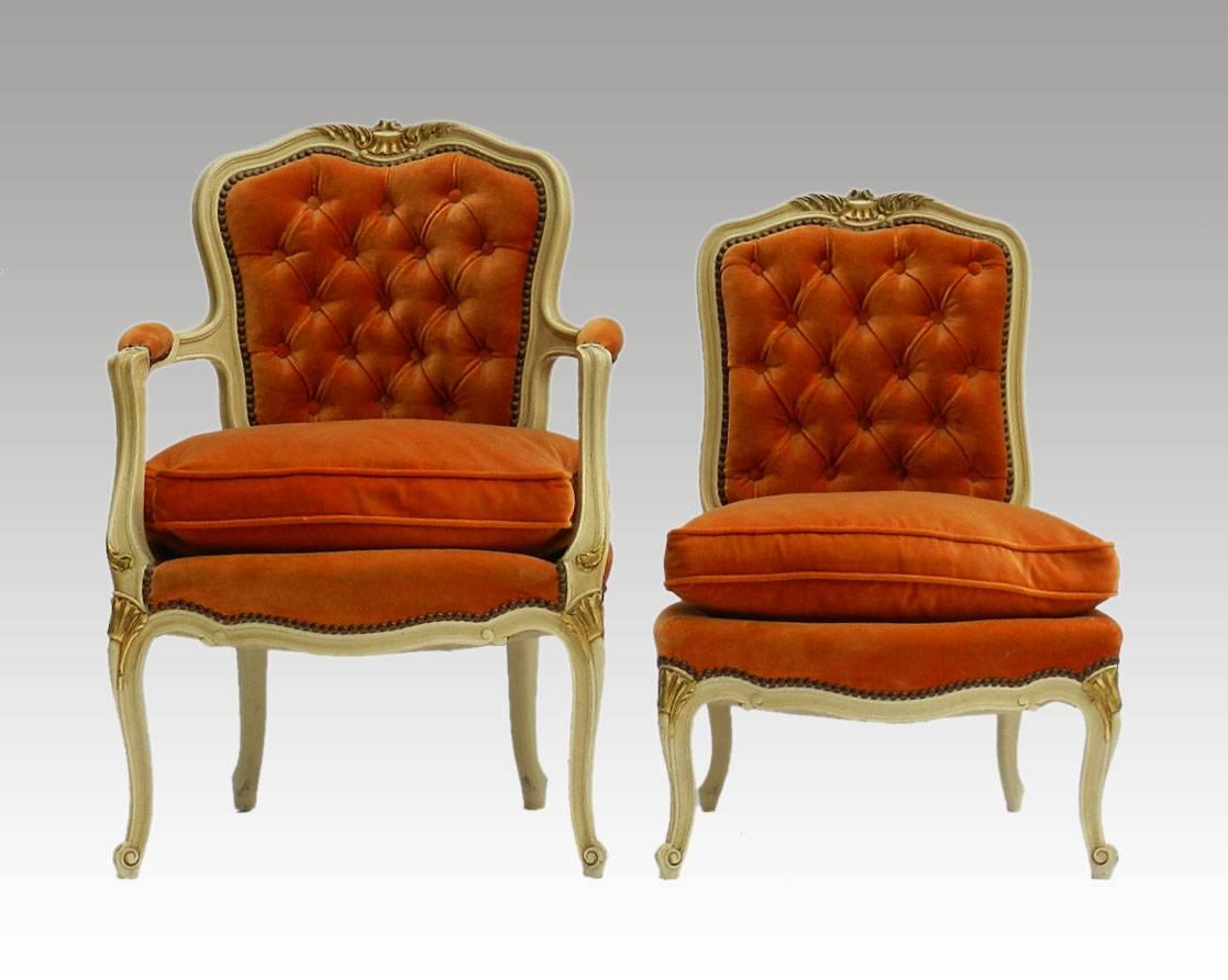 Pair of charming french side chairs vintage Louis XV early 20th century chairs.
Upholstered tufted button backs.
Open armchair and boudoir bedroom chair.
Original craquelure and gold paint.
Upholstery in good condition burnt ginger orange