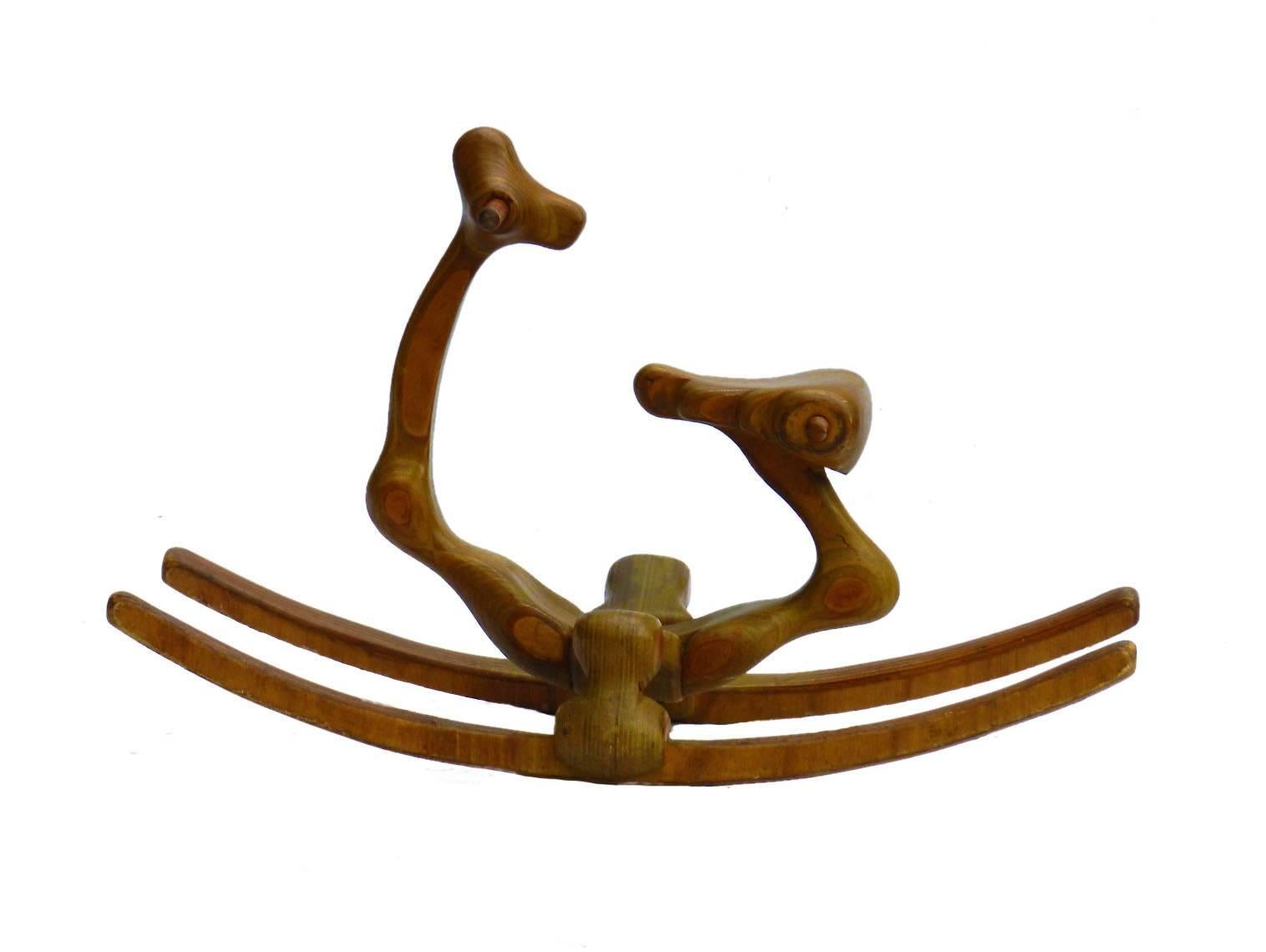 Mid Century Rocking Horse Chair 1970s by the sculptor Denis Cospen, b 1946. 
One of a kind
From his series of Unique Organic Sculptures made in the 1970s Cheval a Bascule.
Hand carved 
Ideal gift for a child or children as a toy also for adults