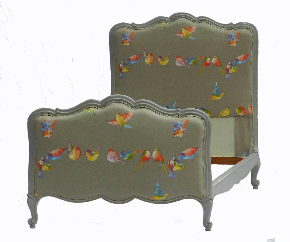 Good pair of French single beds, early vintage Louis.
Twin beds with slatted wood bases ready for mattesses.
Upholstered and recovered in printed linen cotton 'Birds on a Wire'. 
Painted cherrywood frames.

 