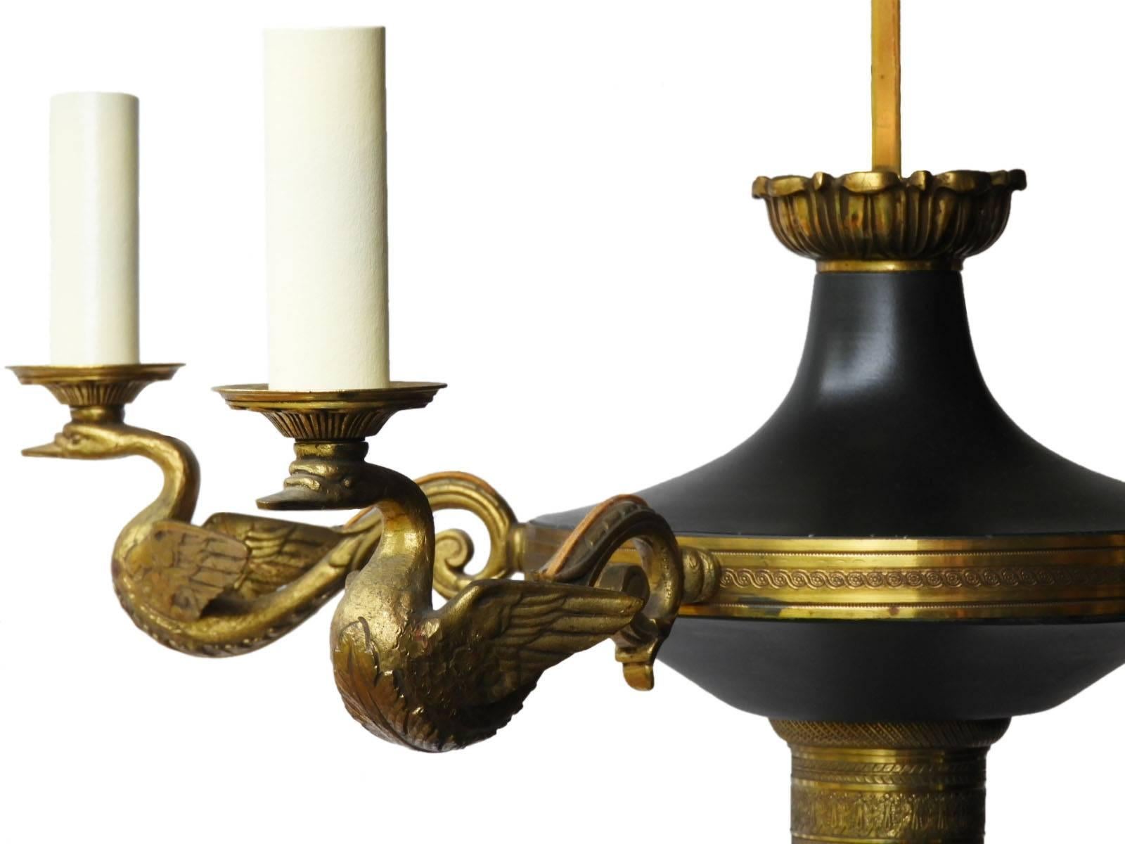 French empire floor lamp French Empire revival early 20th century.
Five branch swan candle lights.
Bronze ormolu details
 Original finish very dark green metal heavyweight bronze with good patina
This will be rewired and tested to USA or UK and