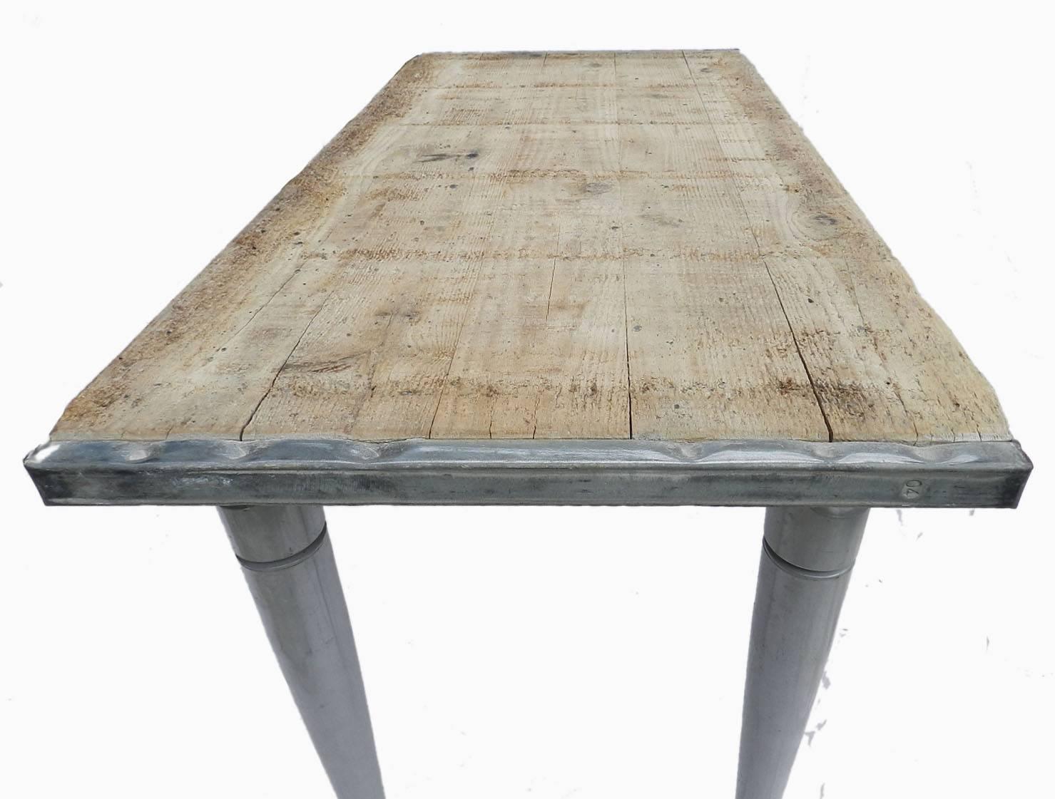 2 Unusual French Industrial side or pair console tables sold separately unless otherwise requested
Loft kitchen
Brute antique rough cut reclaimed wood tops indented with stones typical of the Pays Basque and Spanish agricultural wood
Zinc clad