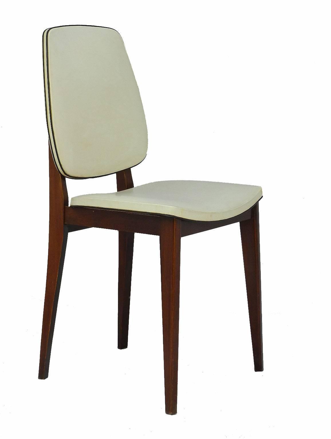 Set of six Mid-Century dining chairs
French vintage, circa 1960-1970
Original vinyl covers with black piping
Polished wood legs
Very good condition sound and solid one chair has a couple of very small marks of use to the back not distracting