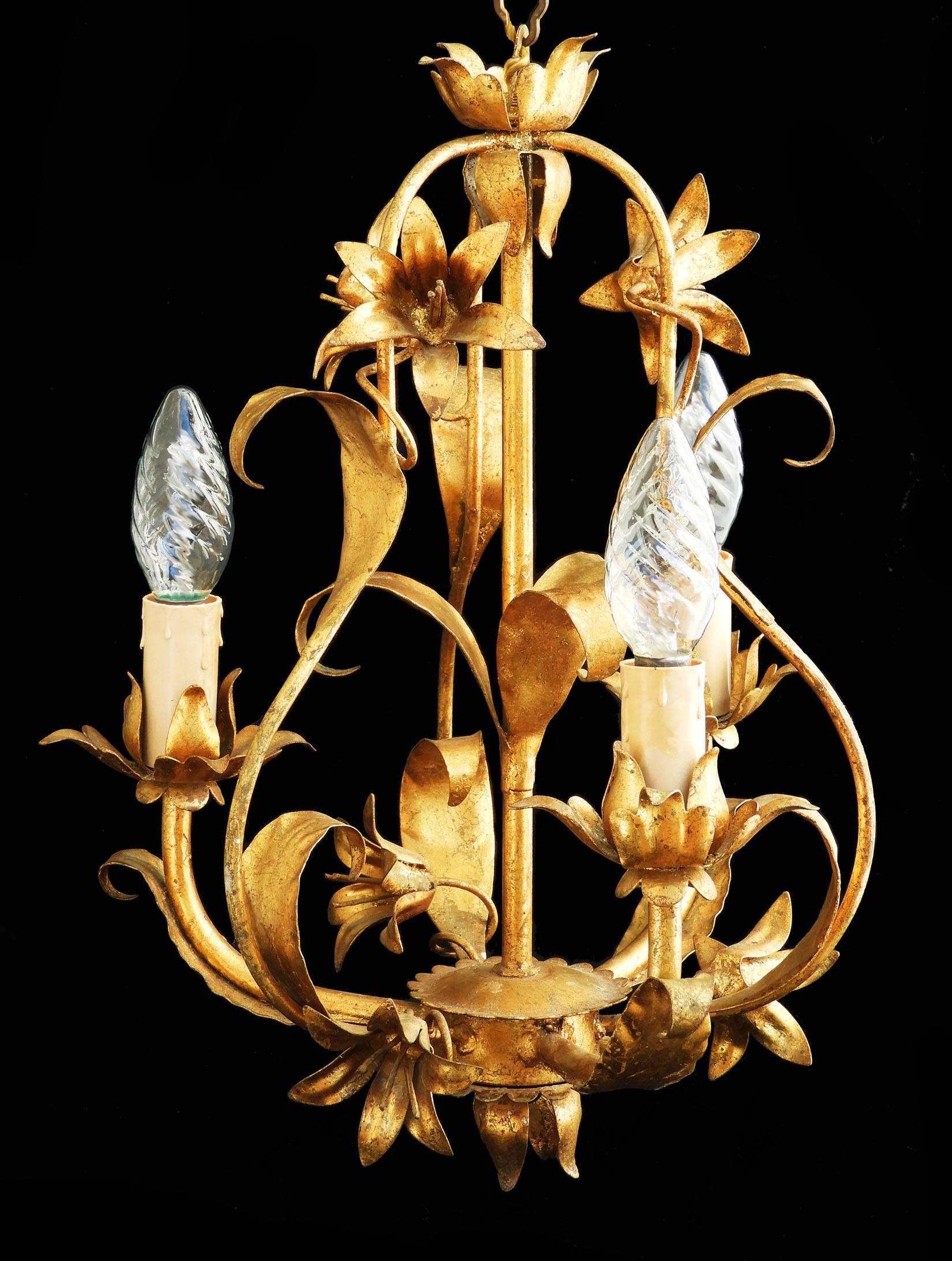 French Mid-Century toleware chandelier circa 1950
Gilded toleware three-light cage chandelier
Drop 72cms can be lengthened to give a longer drop if required please ask
In good original condition
This will be re-wired and tested to USA or UK and