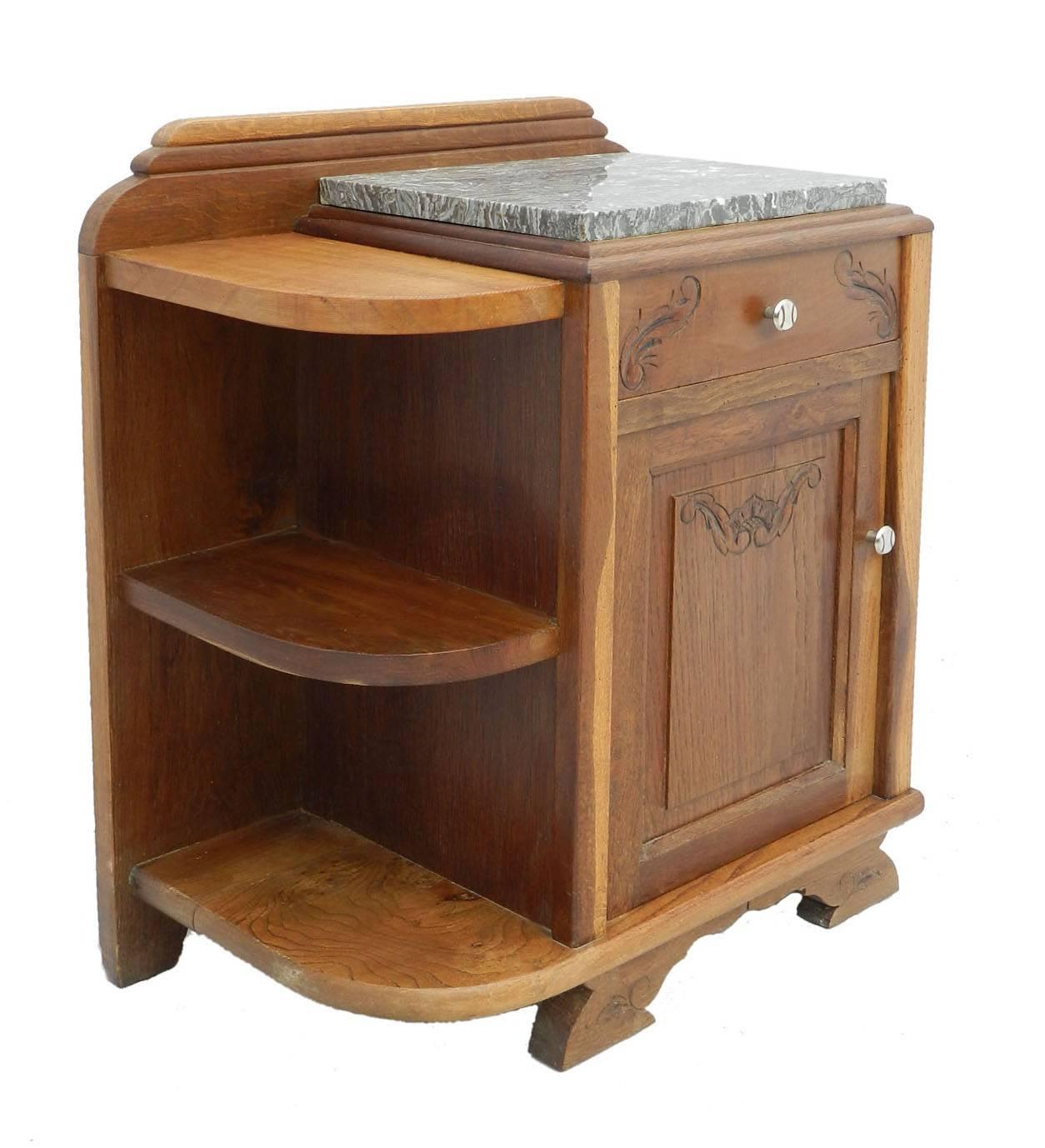 Pair of Art Deco side cabinets bedside tables nightstands
Unusual with side book shelves
French carved solid oak (two color oak)
Variegated marble tops
Good condition for their age with only minor signs of wear for their age.
We offer a global