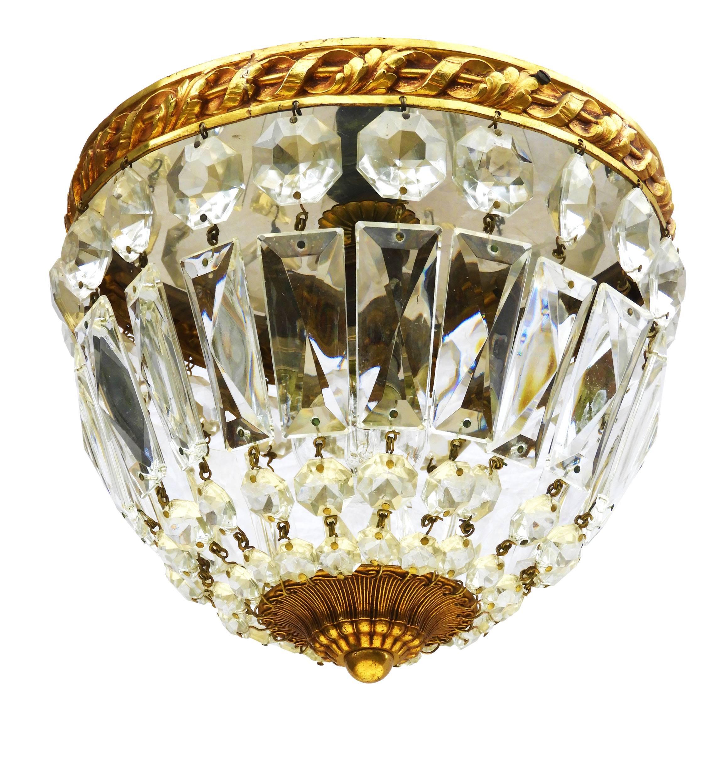 French Flush Mount Ceiling Light  with crystal cut faceted prism glass and gilded bronze c1920-30 Louis XVI revival
Acanthus leaf band
In very good original condition, nice patina with no losses to glass
Could equally be installed and hung as a