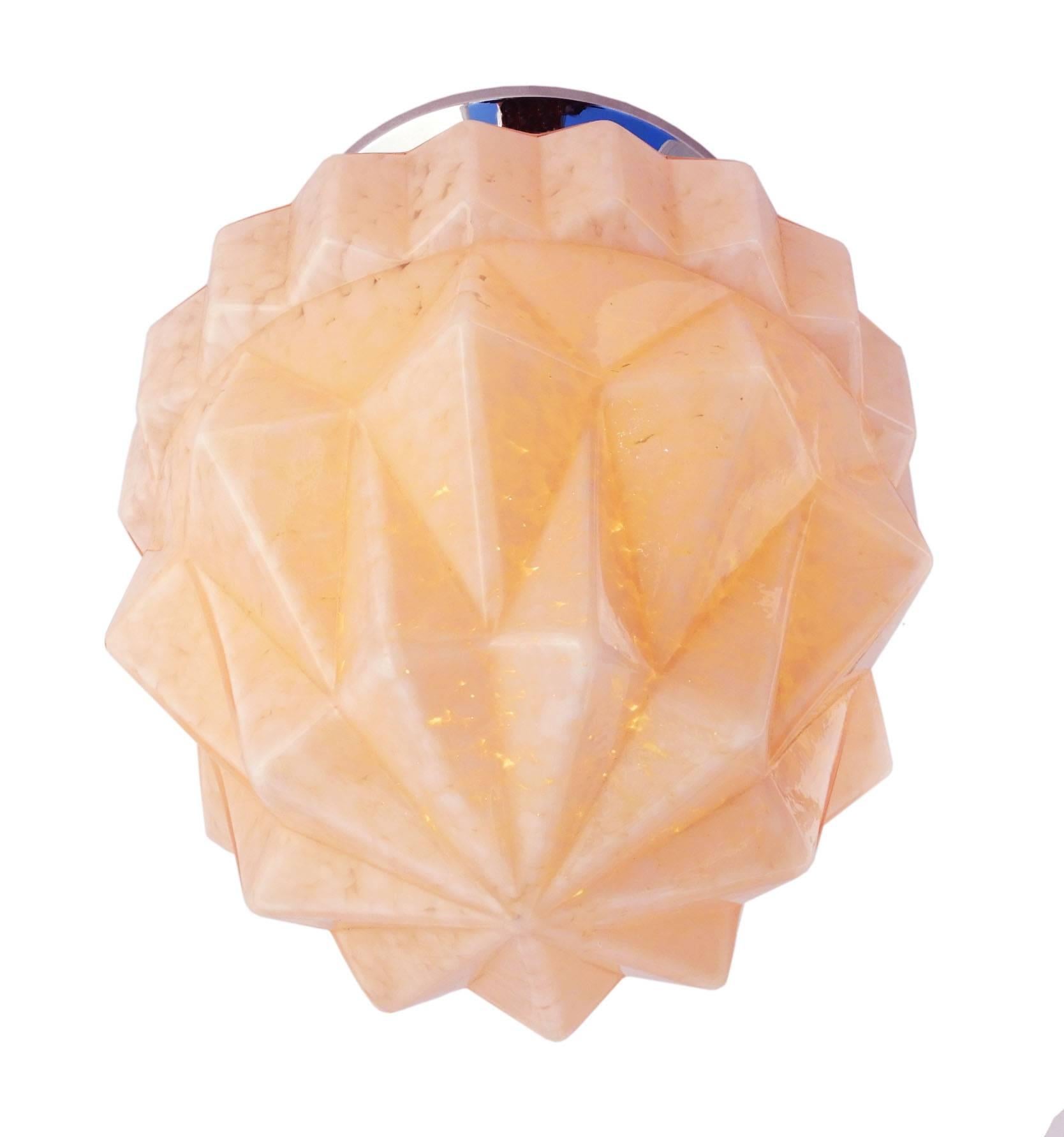 Stunning Art Deco Skyscraper light dusky pink mottled glass original shade on a chrome mount
We can customise this flush mount ceiling light for use as a desk light or as a pendant light.
In good original condition with no losses to glass.
This