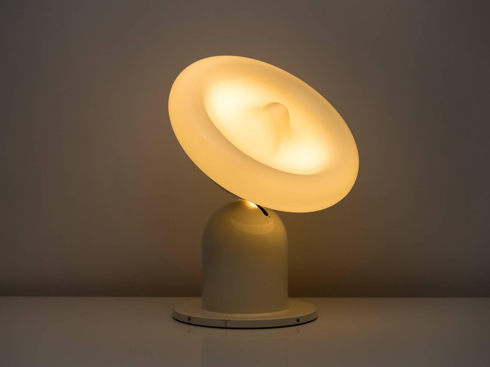 A unique and rare lamp designed by Studio Tetrarch for Lumenform with two points of articulation in the shade and base. Provides a beautiful glow that can positioned in a wide variety of configurations, giving meaning to its name of “Ciucca,” or