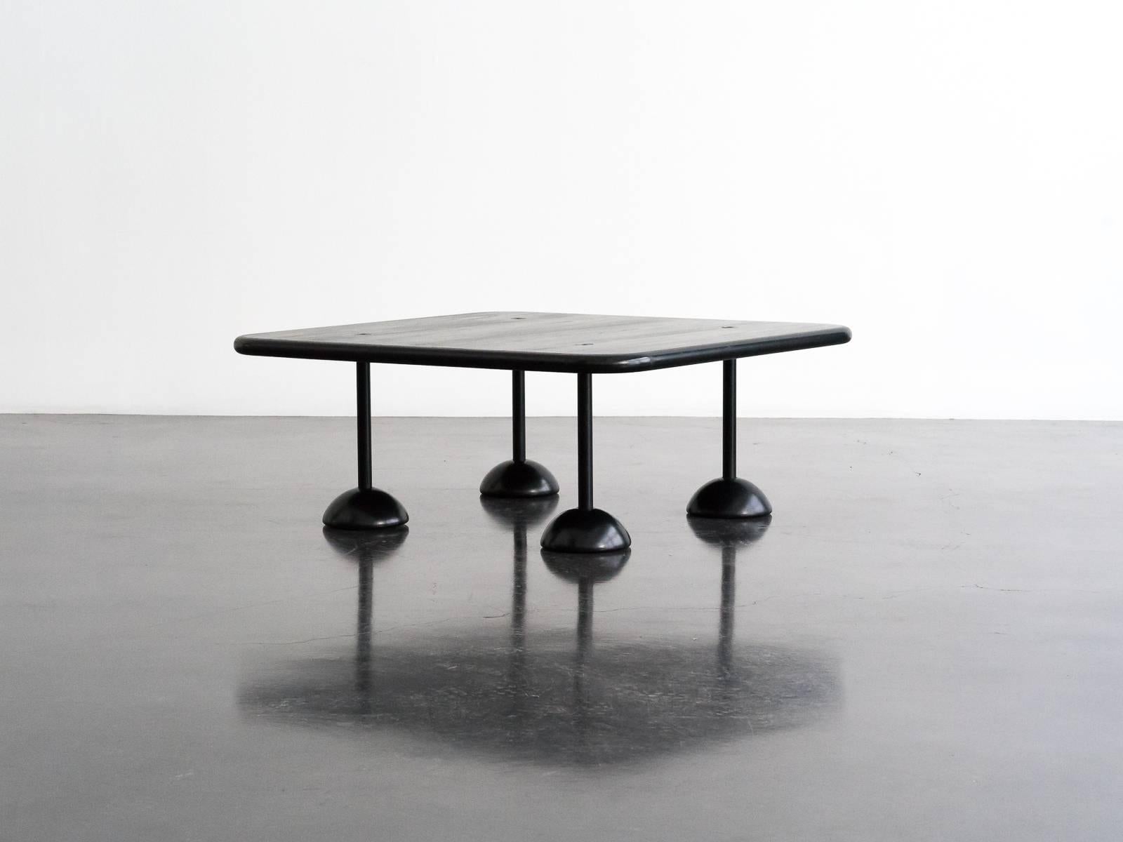 A unique low table designed by Franco Poli for Bernini in 1980. The square 