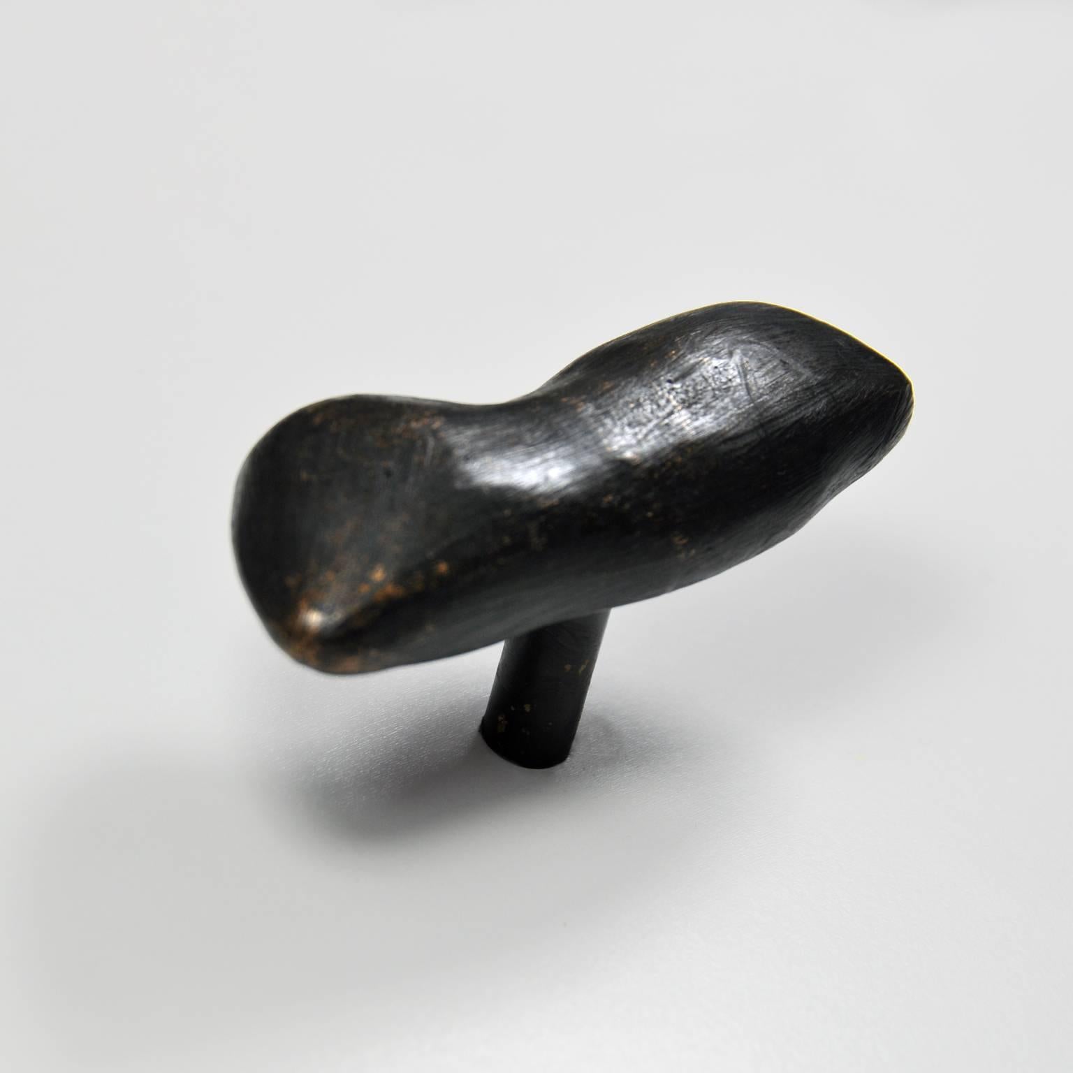 The Edna Drawer Pull is cast out of solid brass before being hand carved, blackened, and lacquered.

Thread: 8-32. Comes with installation screw.