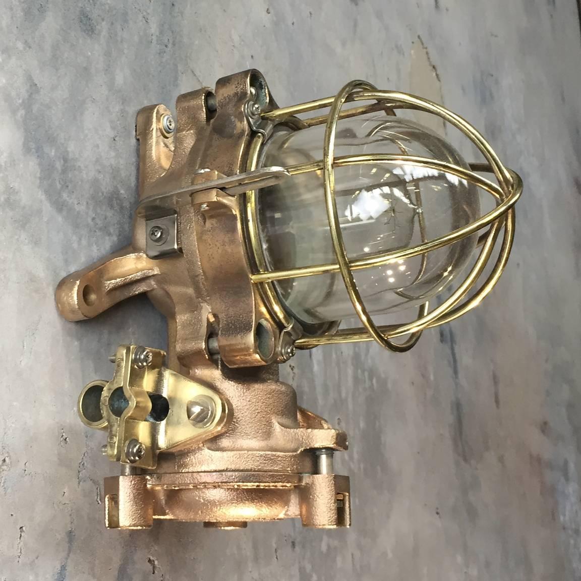 Flame proof copper and brass fitting.

Awesome engineering by Kokosha! Salvaged from a de-comissioned super tanker, fantastically over engineered.
Cast from copper with a brass cage and tempered glass dome. 

Great for ceilings or walls or we